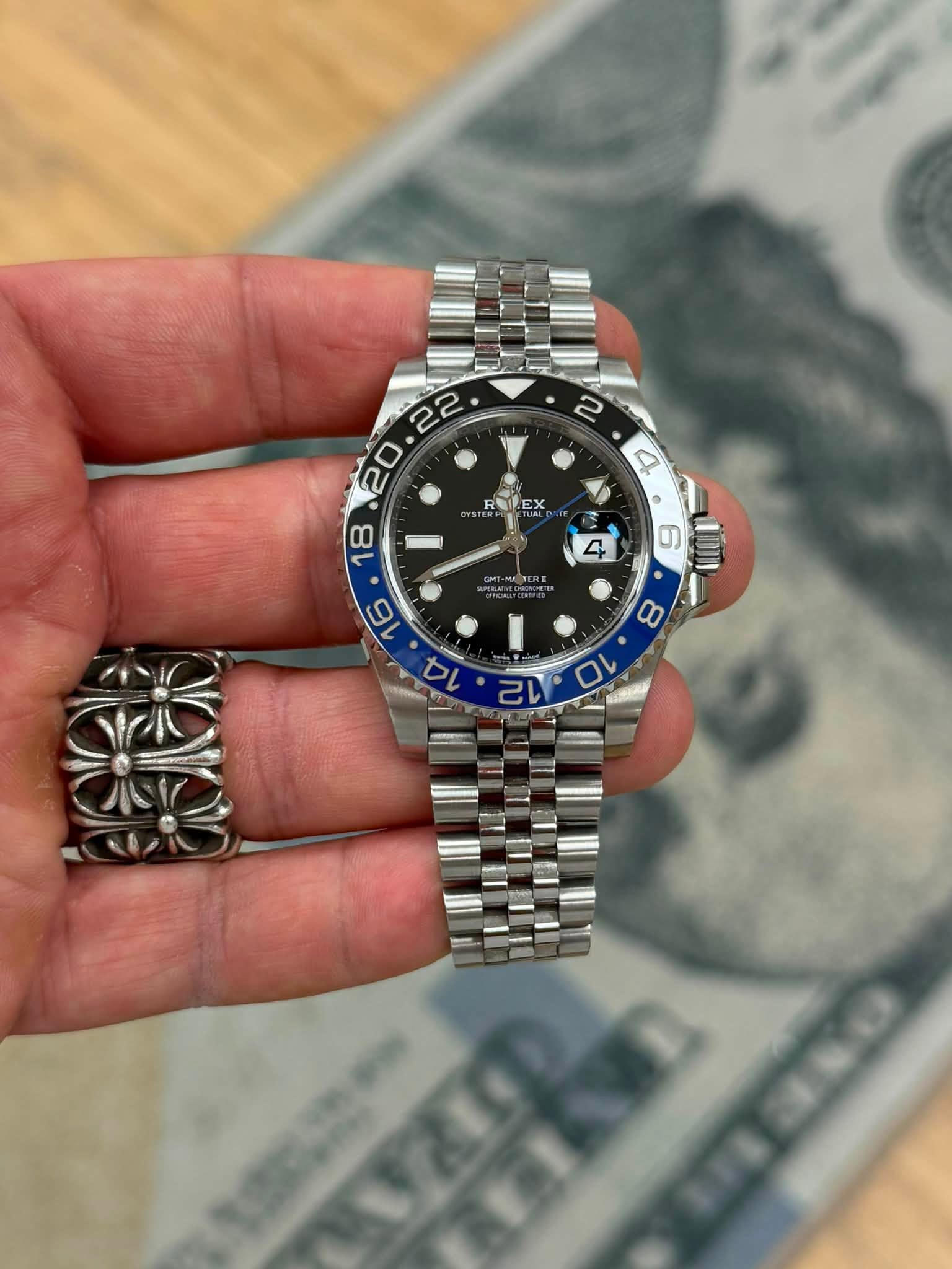 May be an image of wrist watch and text that says ' ELLEX • ወ '