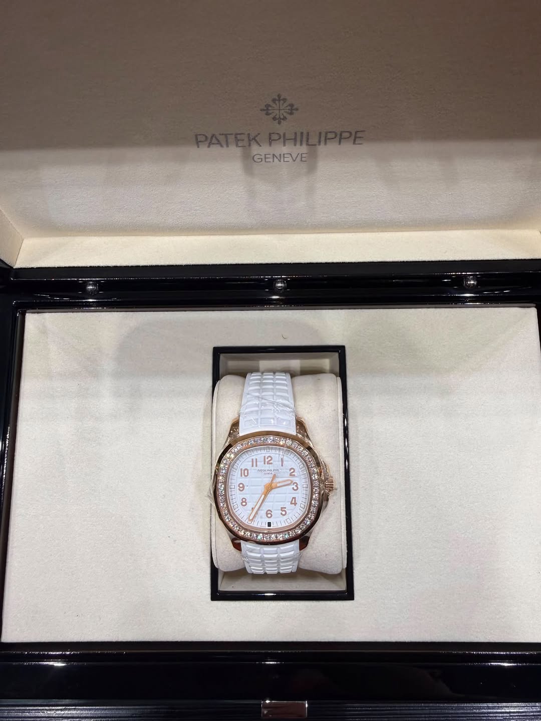 May be an image of wrist watch and text