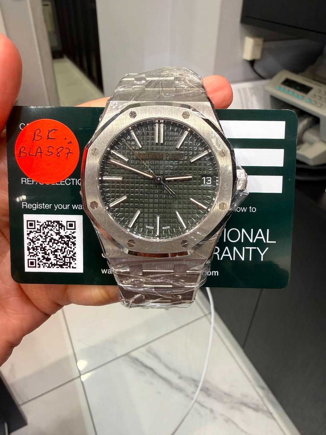 May be an image of wrist watch and text