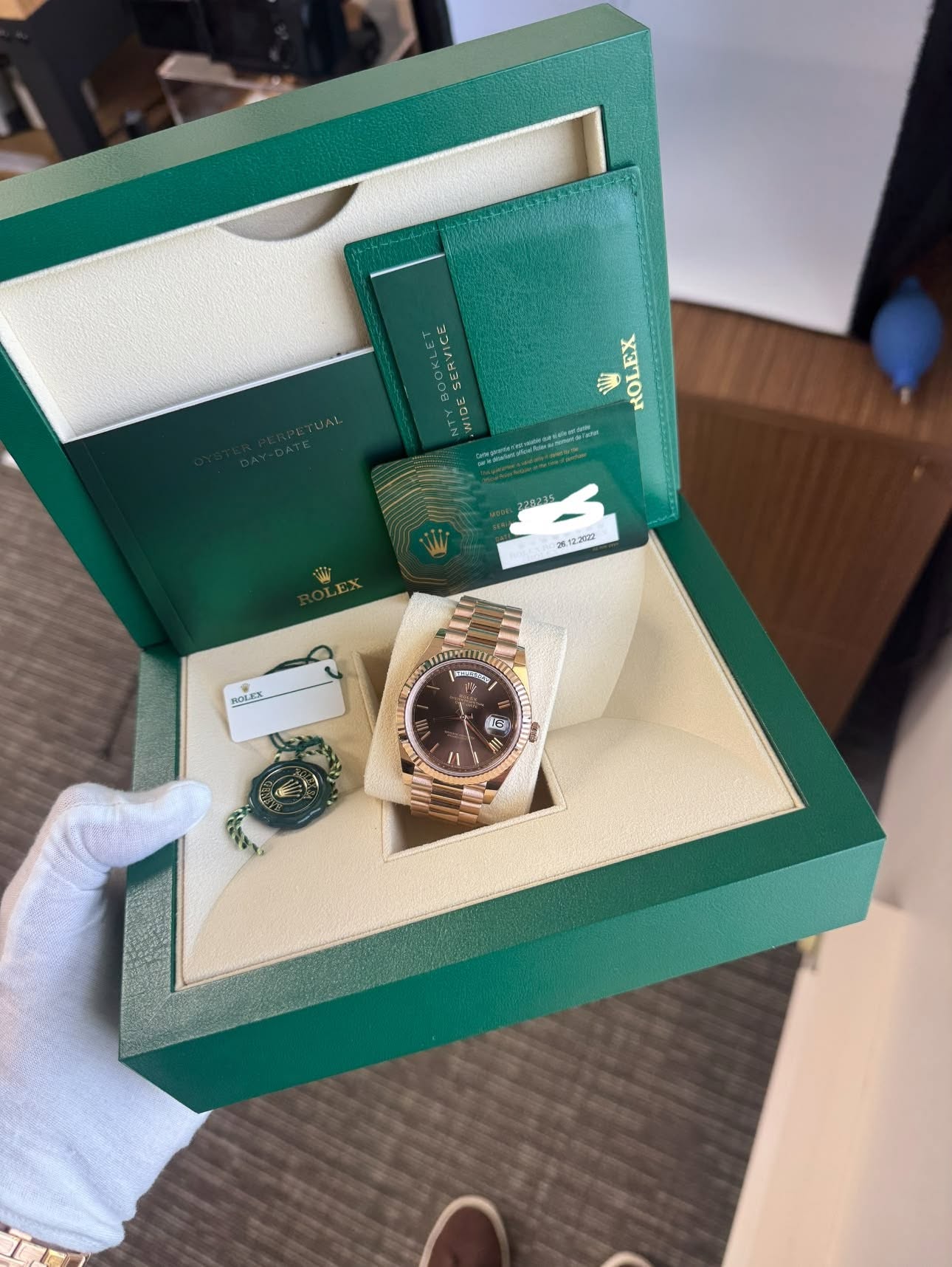 May be an image of wrist watch and text