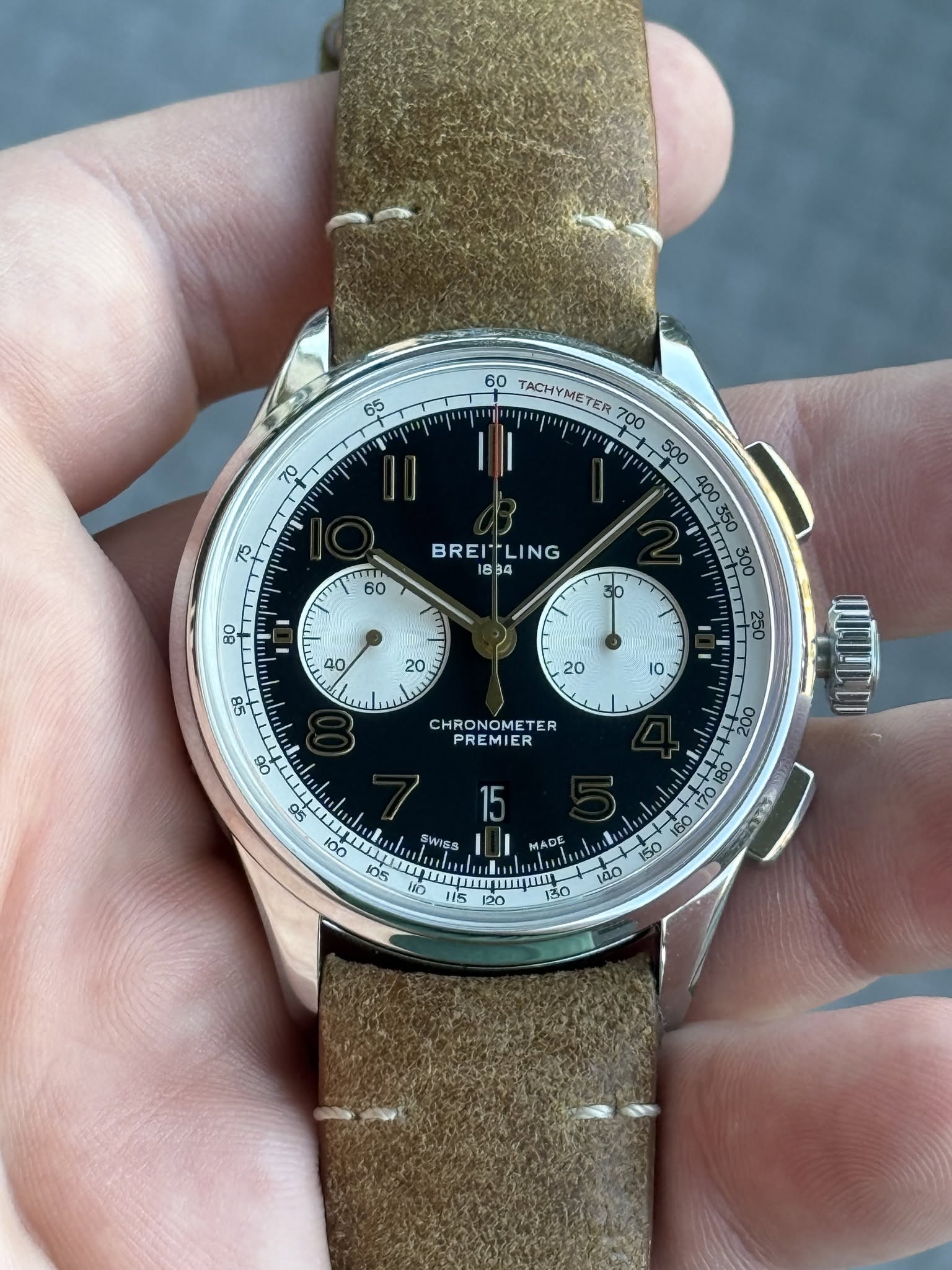 May be an image of wrist watch and text that says '65 70 60 TACHYMETER TACHY "ጣ. יד 60 BREILING ತ್ರಂ 40 20 9B 20 10 go CHRONOMETER PREMIER 300 250 e NULU ፪ተ LII SWISS SOS eesoi…