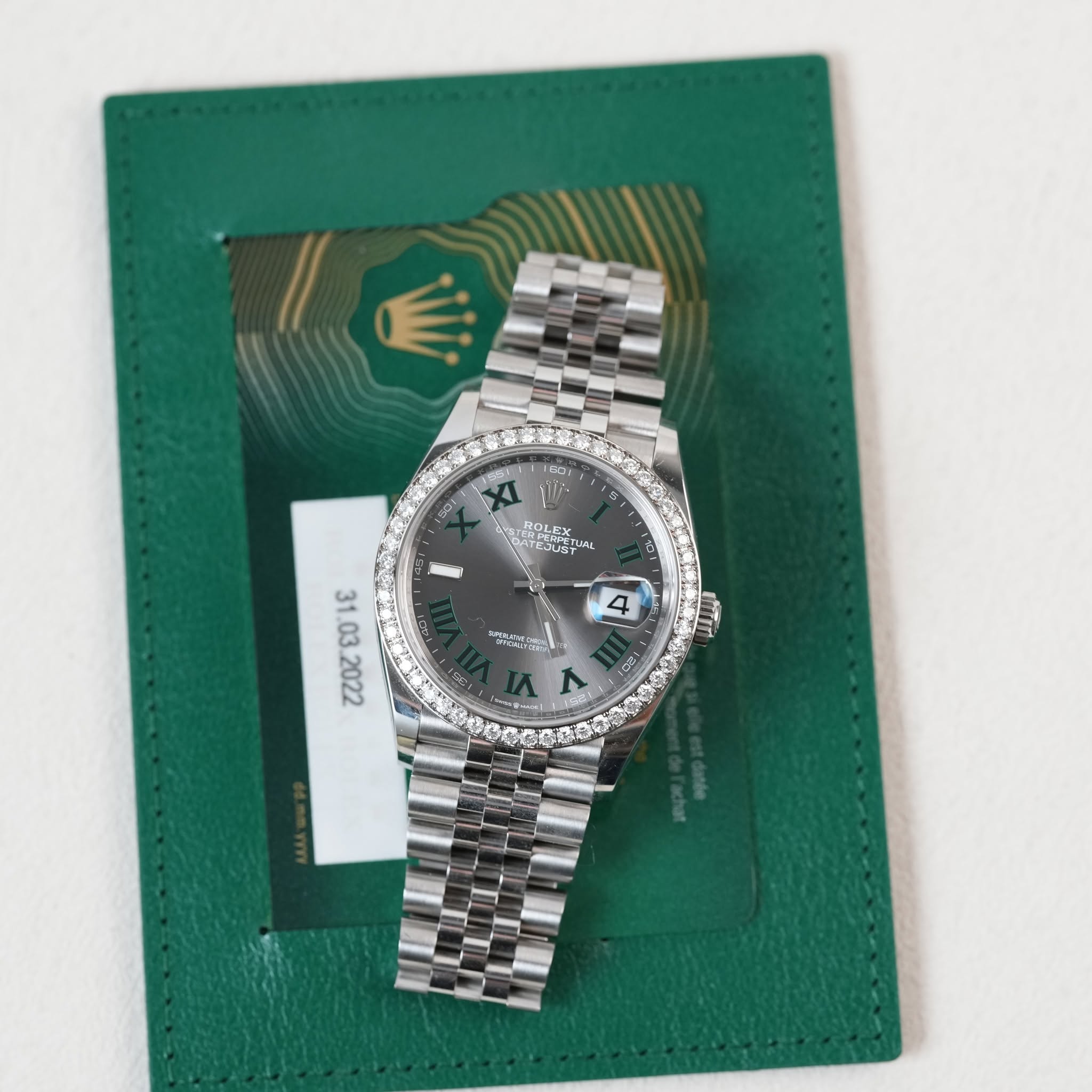 May be an image of wrist watch and text that says '16g 50 30 HOLEX ピエト CUUGT LST" TeM 1 بی డి 2022 4 K _ن ወድ ٨ CB 1'