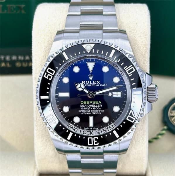 May be an image of wrist watch and text that says '50 ORI ROLEX PERPE UAL DATE ALVE 10 + 1 0 ต 20 40 DEEPSEA SEA-DWELLER 12800/t 128000 SEADWELLER ・3900m 39000 Oim ARMOMETE o…