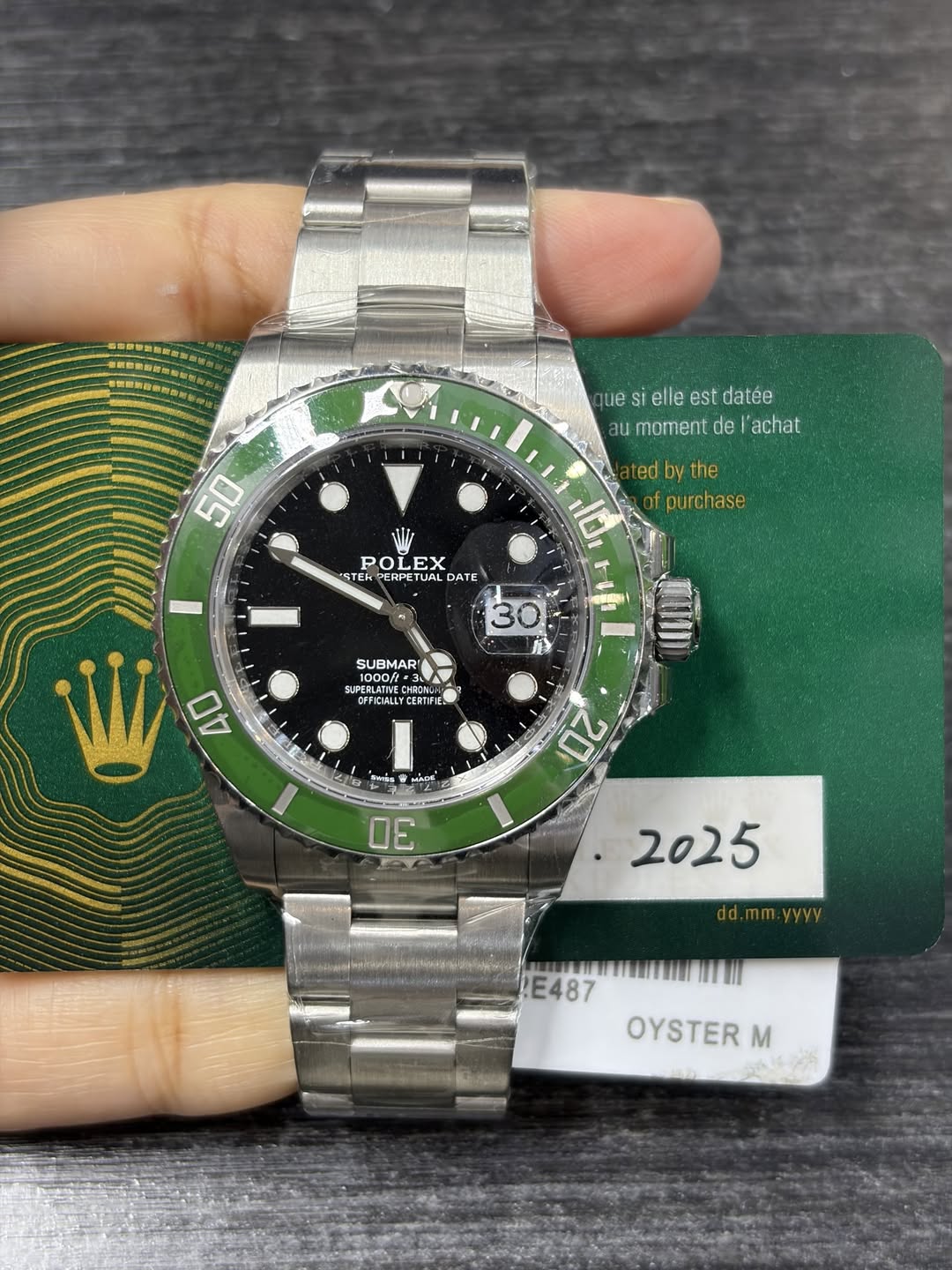 May be an image of wrist watch and text that says 'quesielleestdatée ue SI elle est datée aumomentde'achat au moment de 'achat 50 purchase POL POLEX EX STER PERPETUA DATE DATE 30…