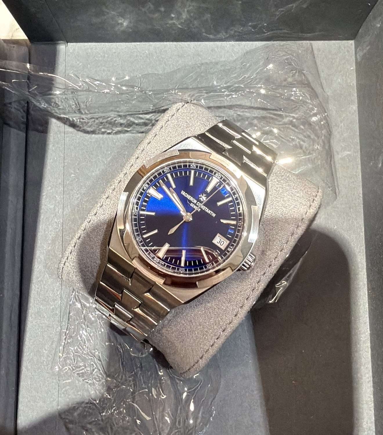 May be an image of wrist watch and text