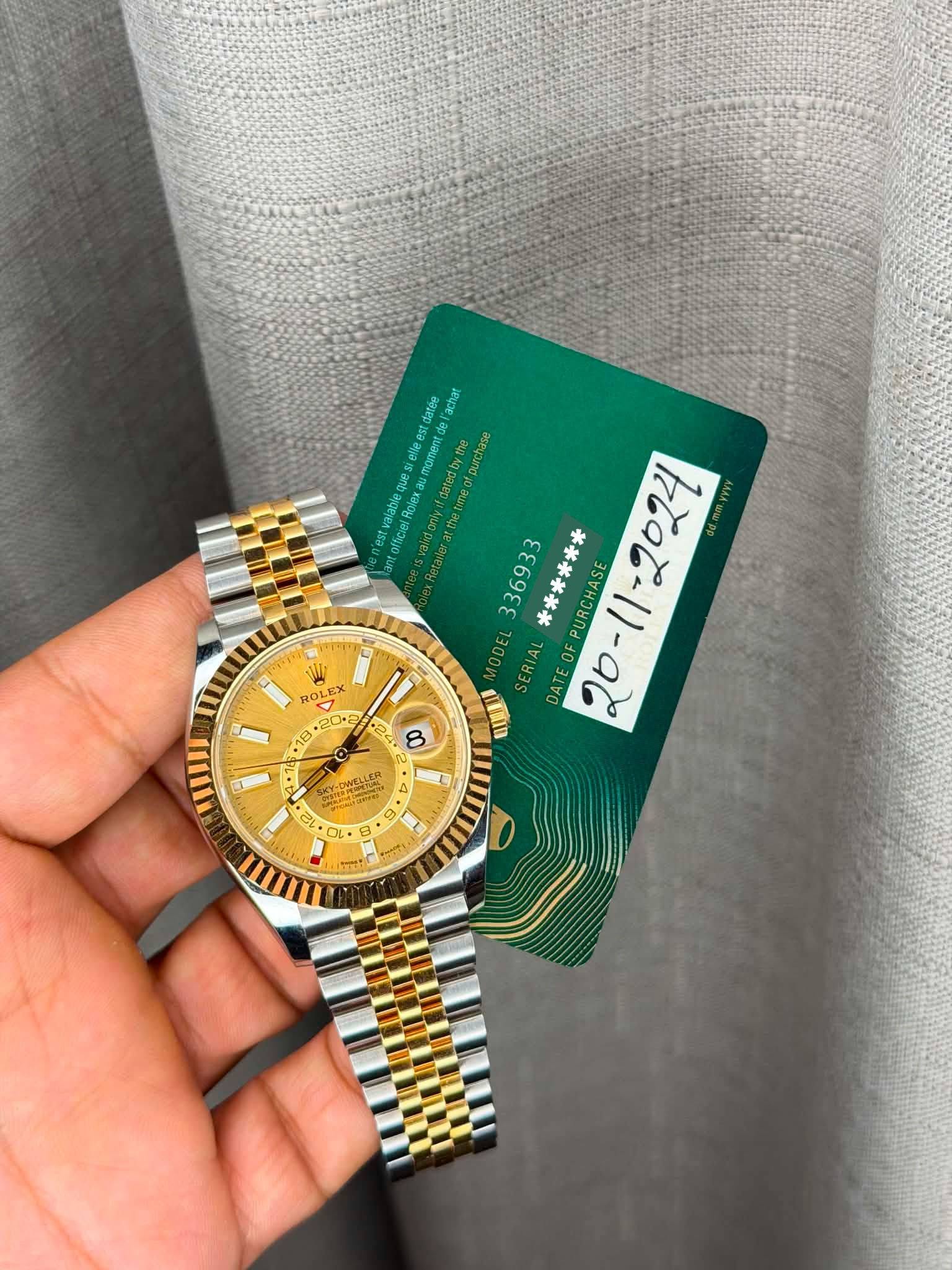 May be an image of wrist watch and text
