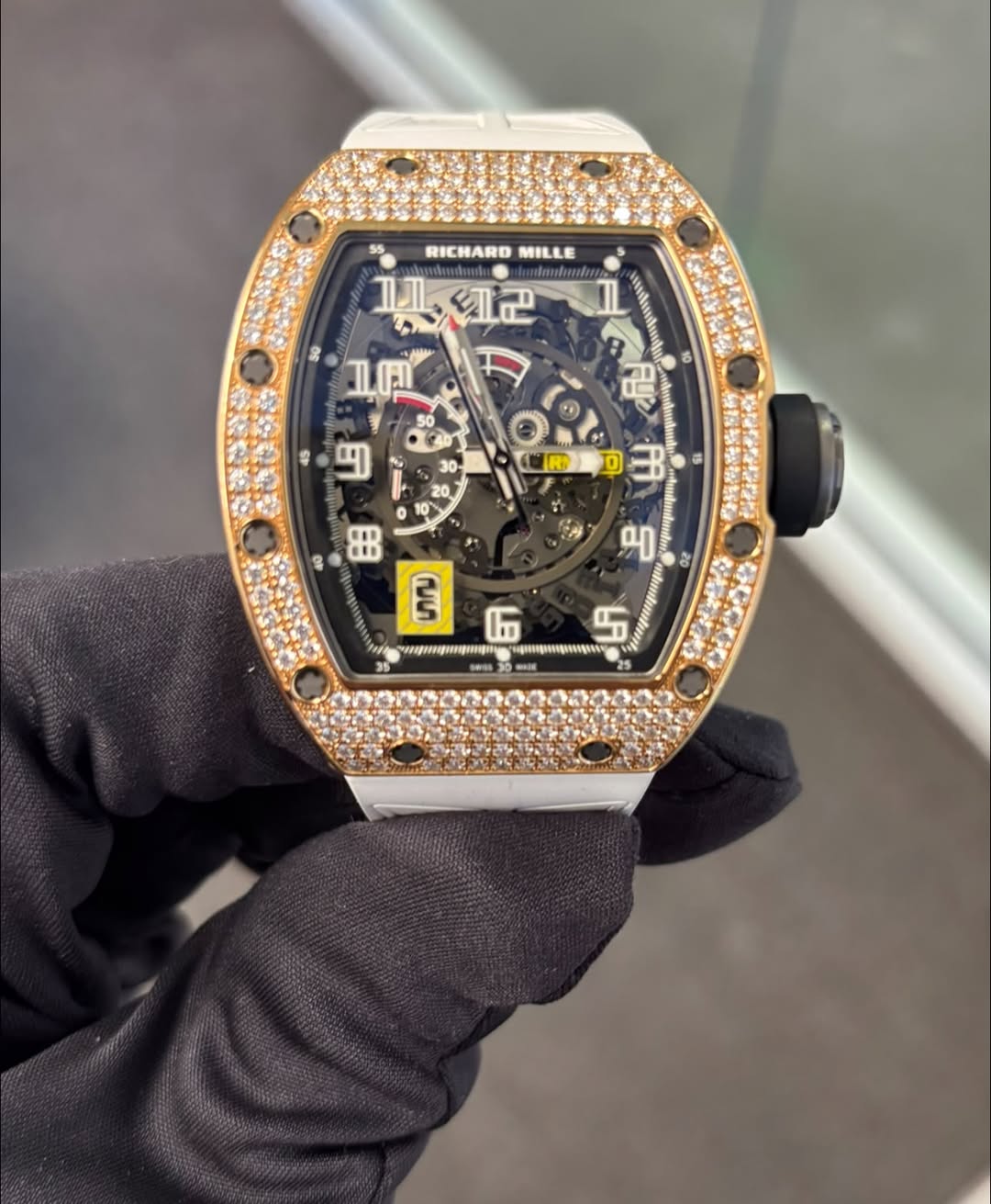 May be an image of wrist watch and text