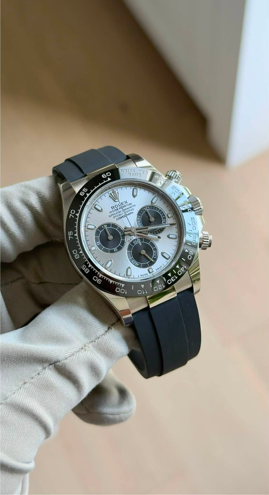 May be an image of wrist watch and text