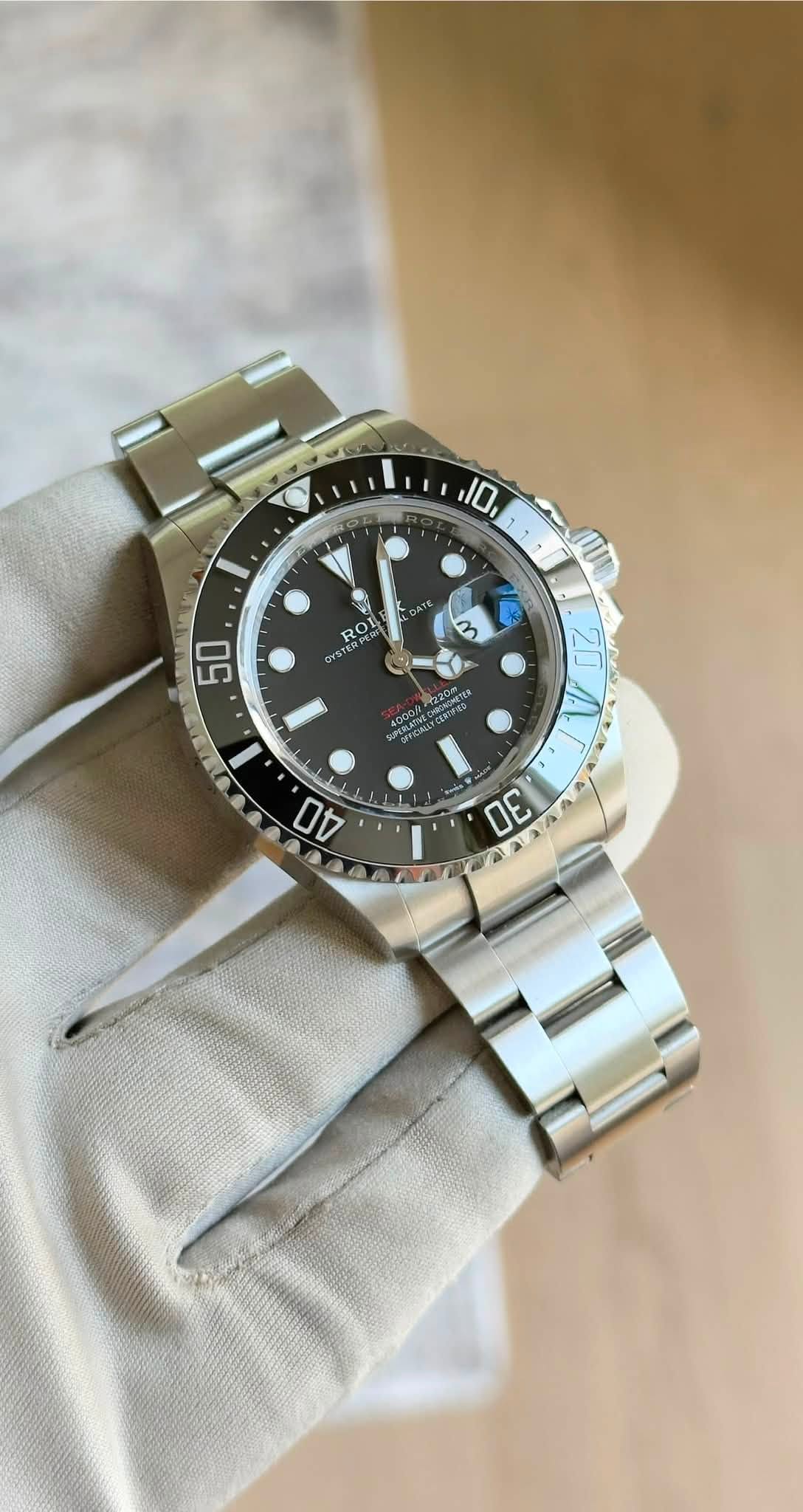May be an image of wrist watch and text