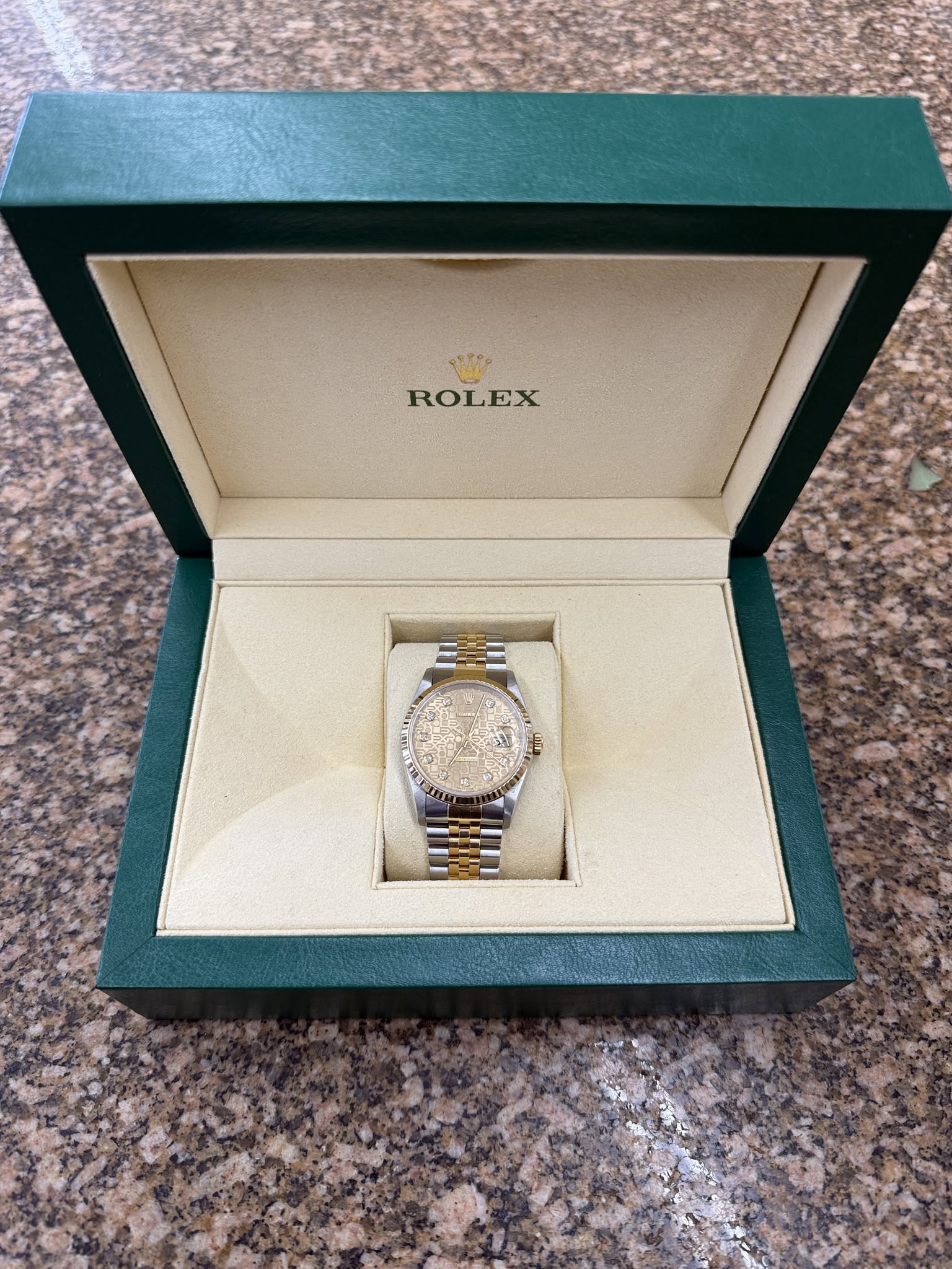 May be an image of wrist watch and text that says 'ROLEX'