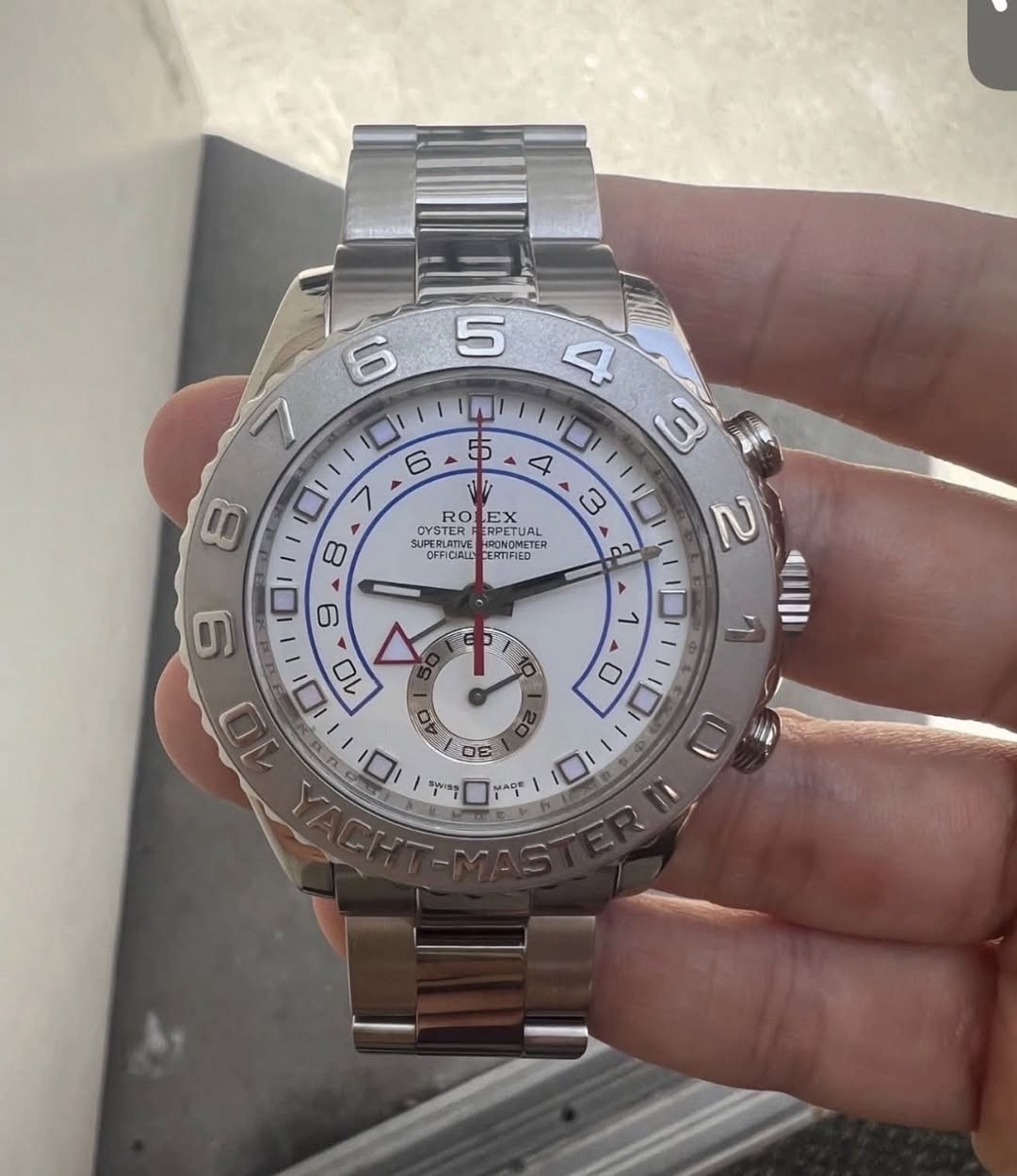 May be an image of wrist watch and text that says '5 6 יב あ 4 3 נ RO EX SUPESUATUE FOGNON OYSTER ERPETU SUPERLATIVE RPETUAL NCTER JAL o PERERUVE PONONETER OFFICIALL EATIFIED…