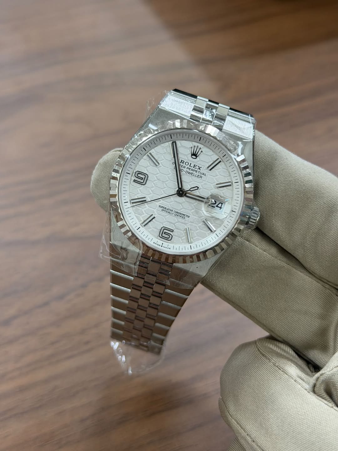 May be an image of wrist watch and text