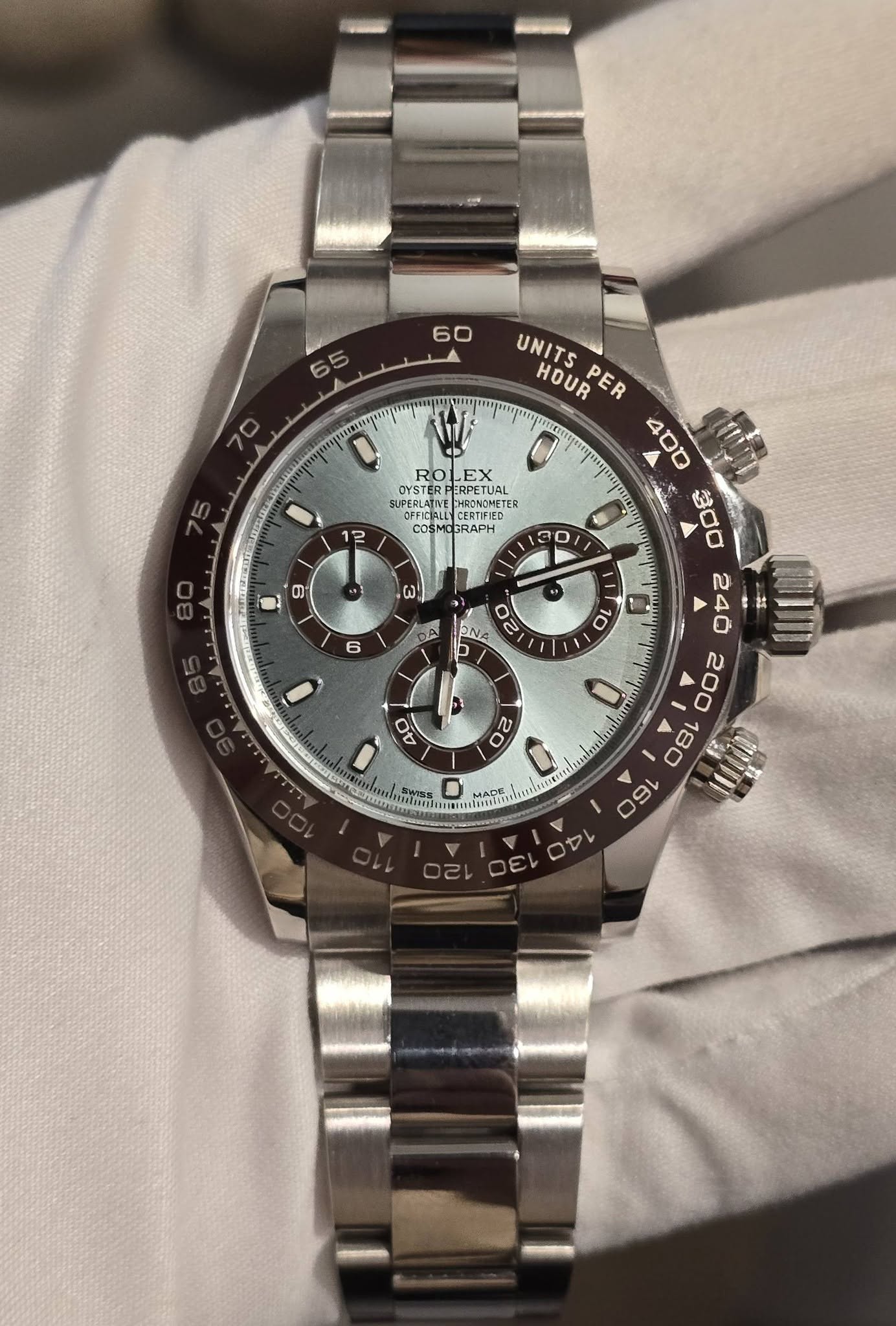 May be an image of wrist watch and text