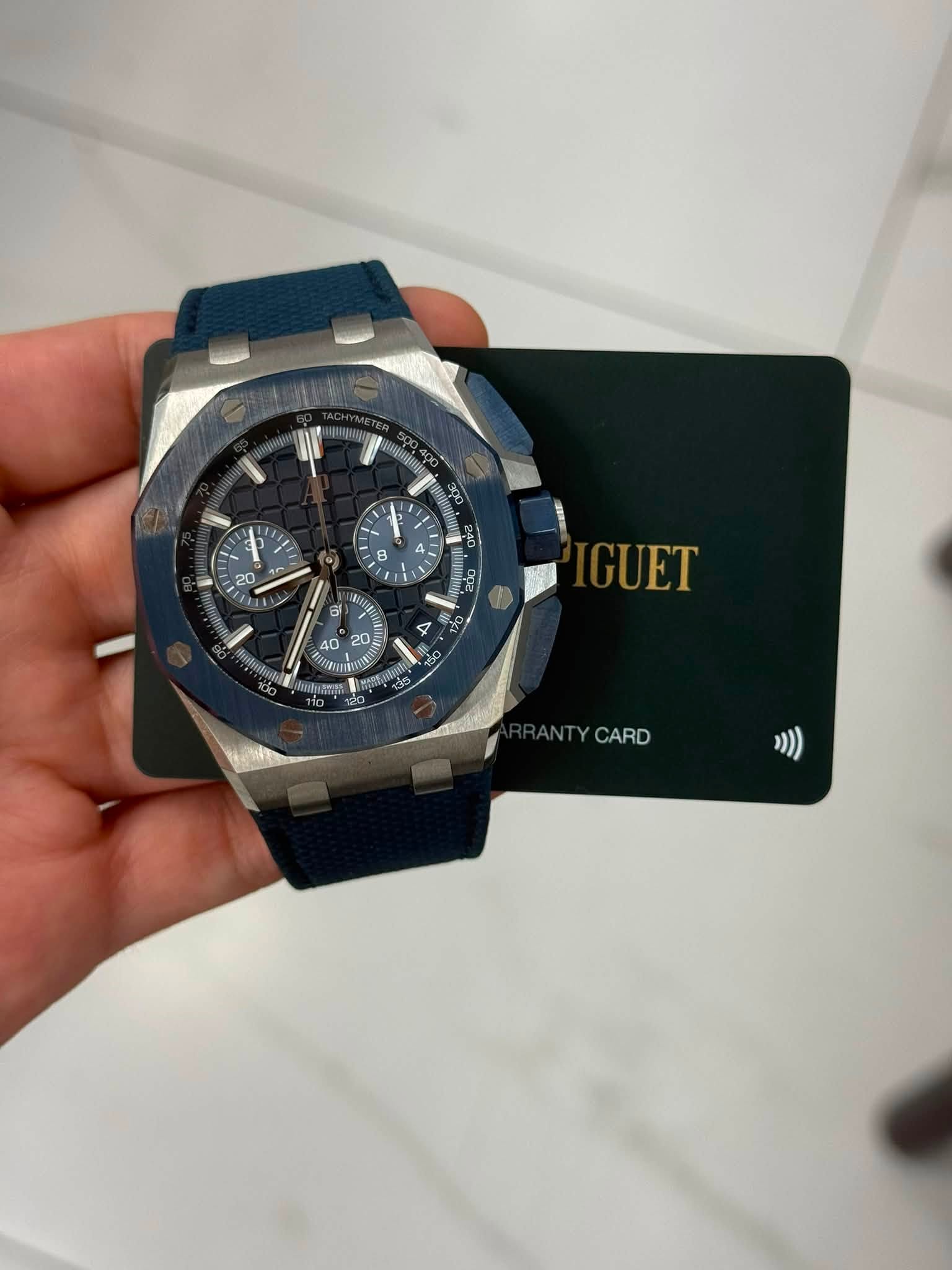 May be an image of wrist watch and text
