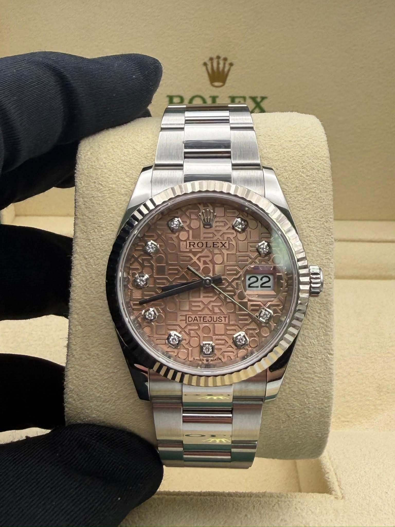 May be an image of wrist watch and text