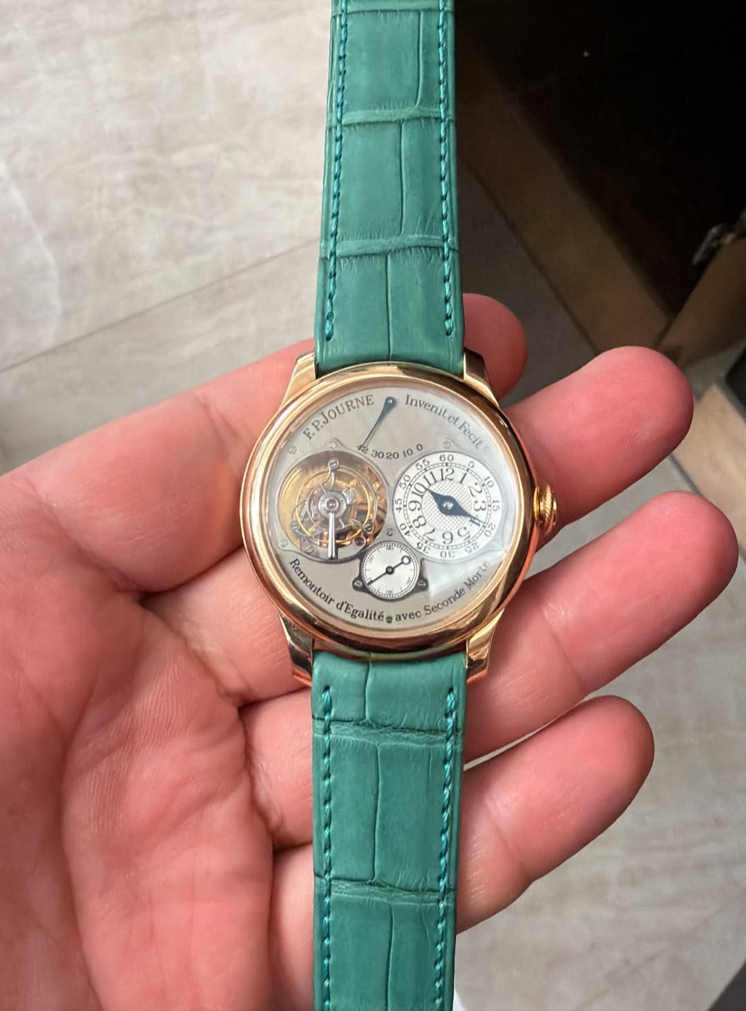 May be an image of wrist watch and text that says 'PJOURNE 0 泉 3020 o Invenite Fecit 60 E قن و 이삼 2 A O 0 o ထ ឆ្ុនស P Remontoir atoir ort d'Egalité avec Seconde'