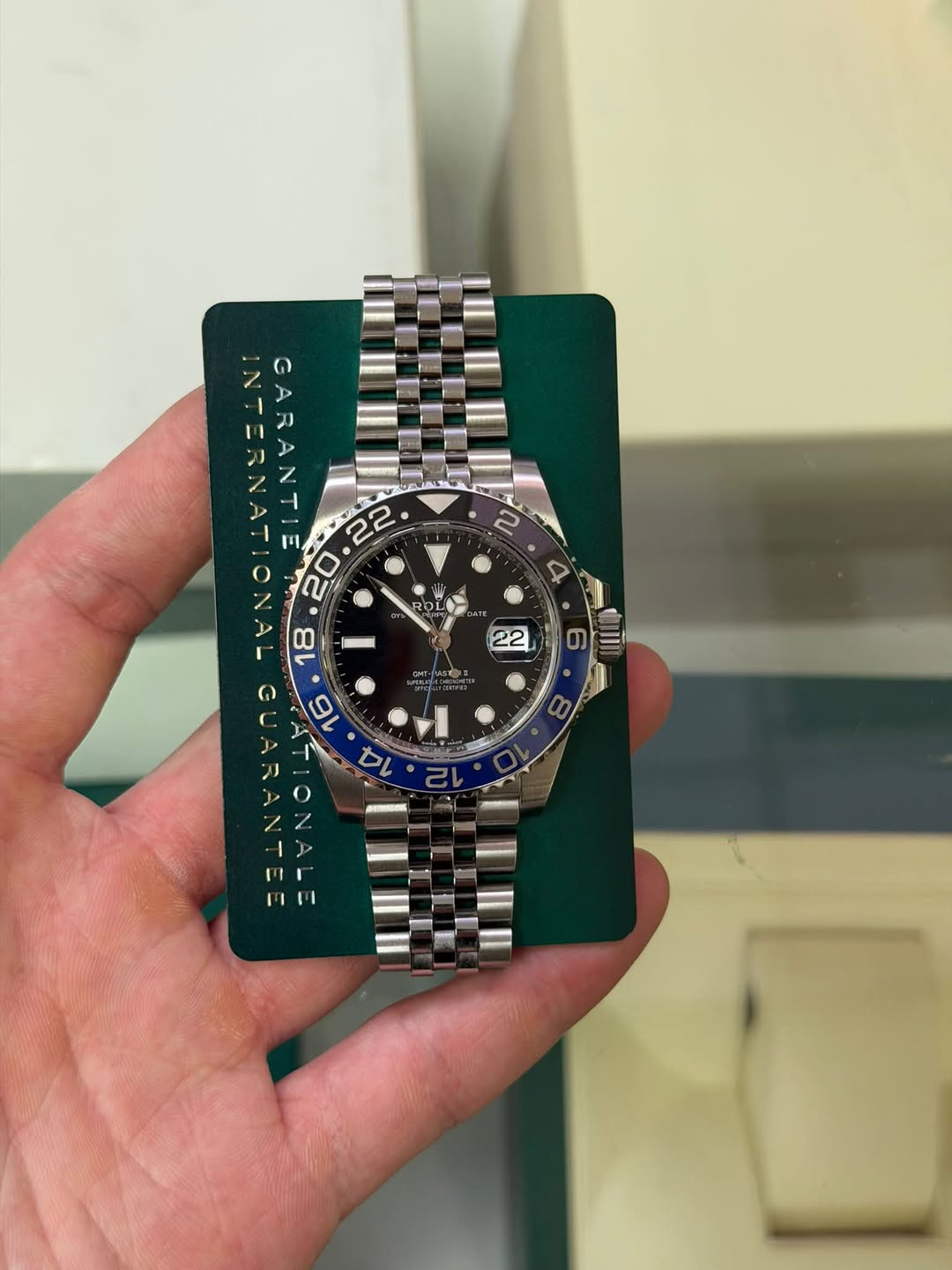 May be an image of wrist watch and text