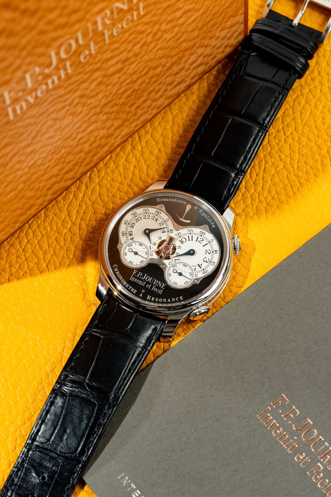 May be an image of wrist watch and text