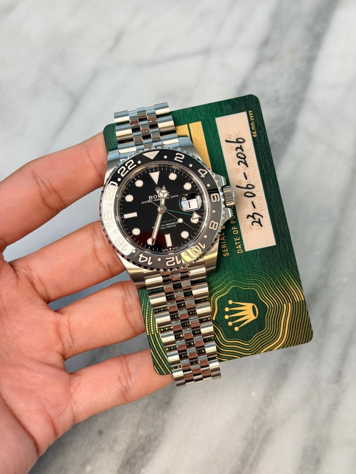 May be an image of wrist watch and text that says '2 22 4 ROL কেমা " C 18 L SHge dd.mm.vyvY 2026 9 II 8 OF - SERT DATE '