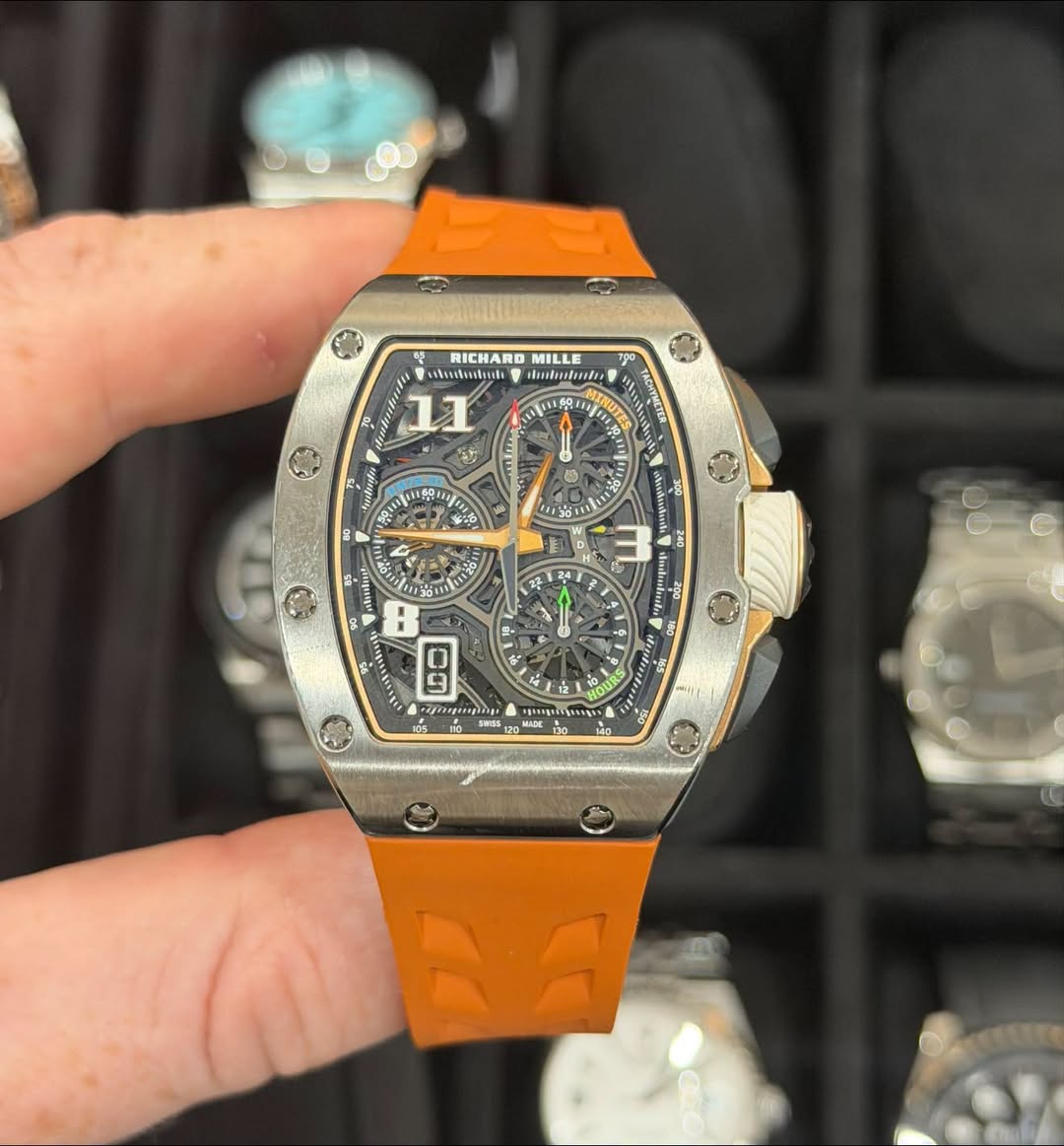 May be an image of wrist watch and text