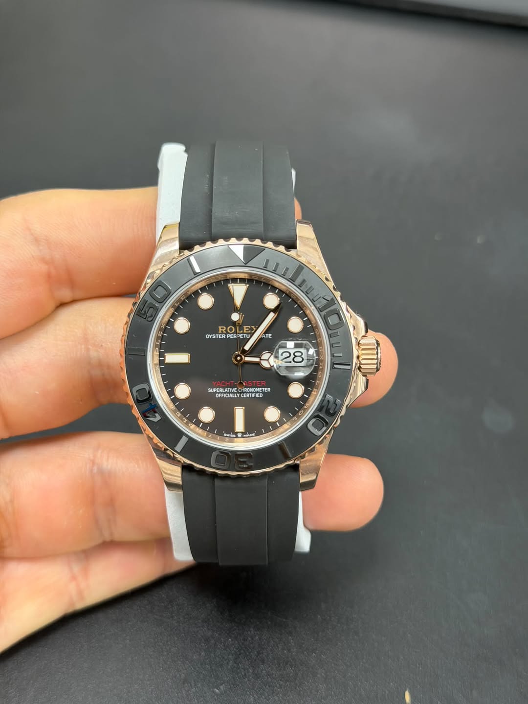 May be an image of wrist watch and text