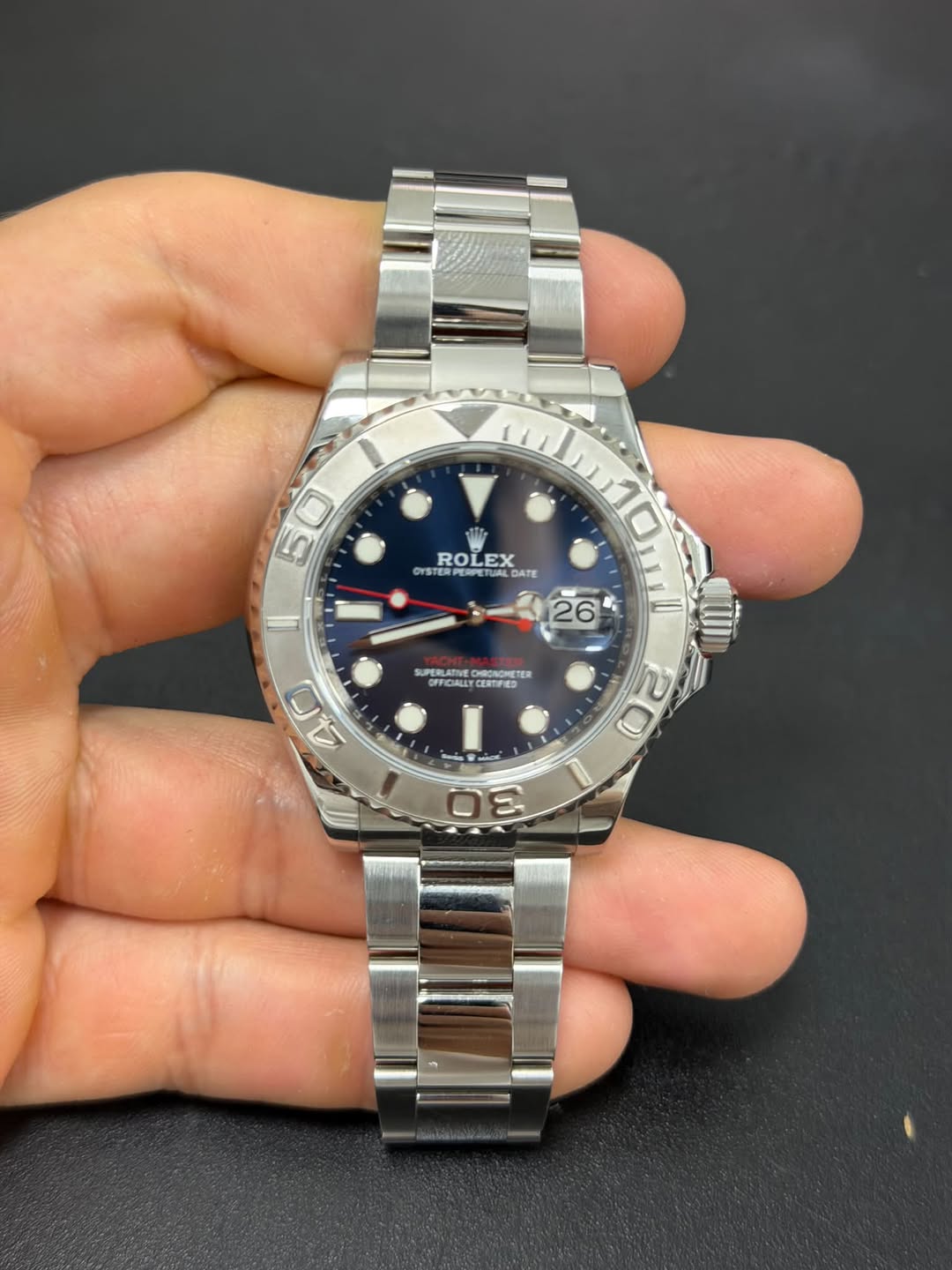 May be an image of wrist watch and text that says '50 5 YSTERPE ROLEX CX GYSTI TERPERFE ROLEXATE ERPETU TUAL LOA DATE 26 10 SUPERLATINE DHRONGHETER OFFICIALLY CERTFIED 40 20 O 30 S…