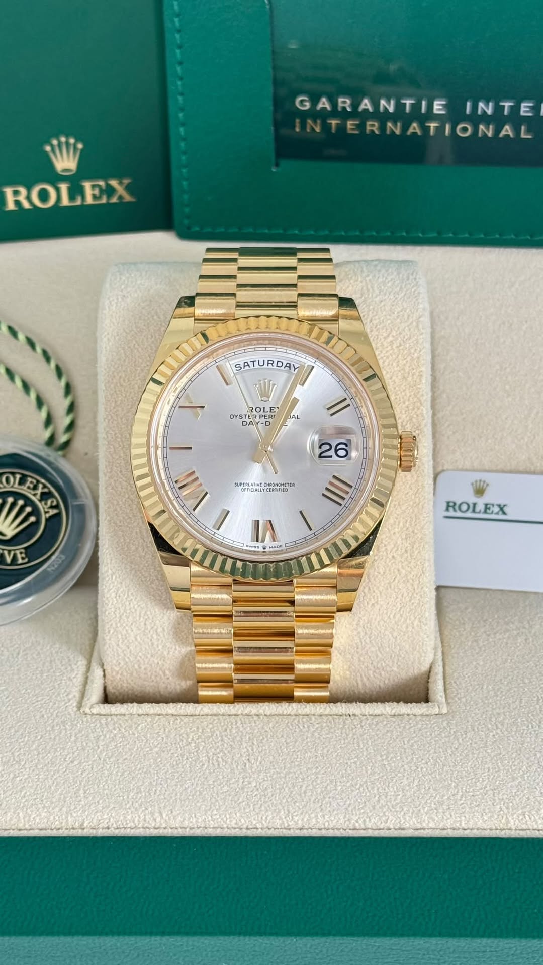May be an image of wrist watch and text