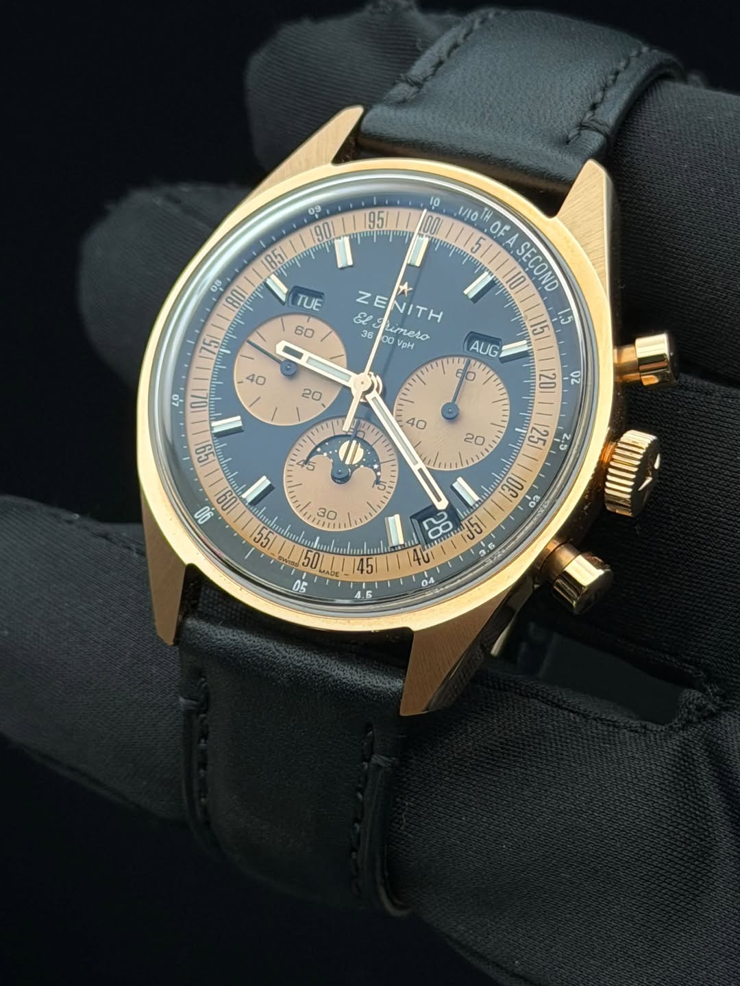 May be an image of wrist watch and text