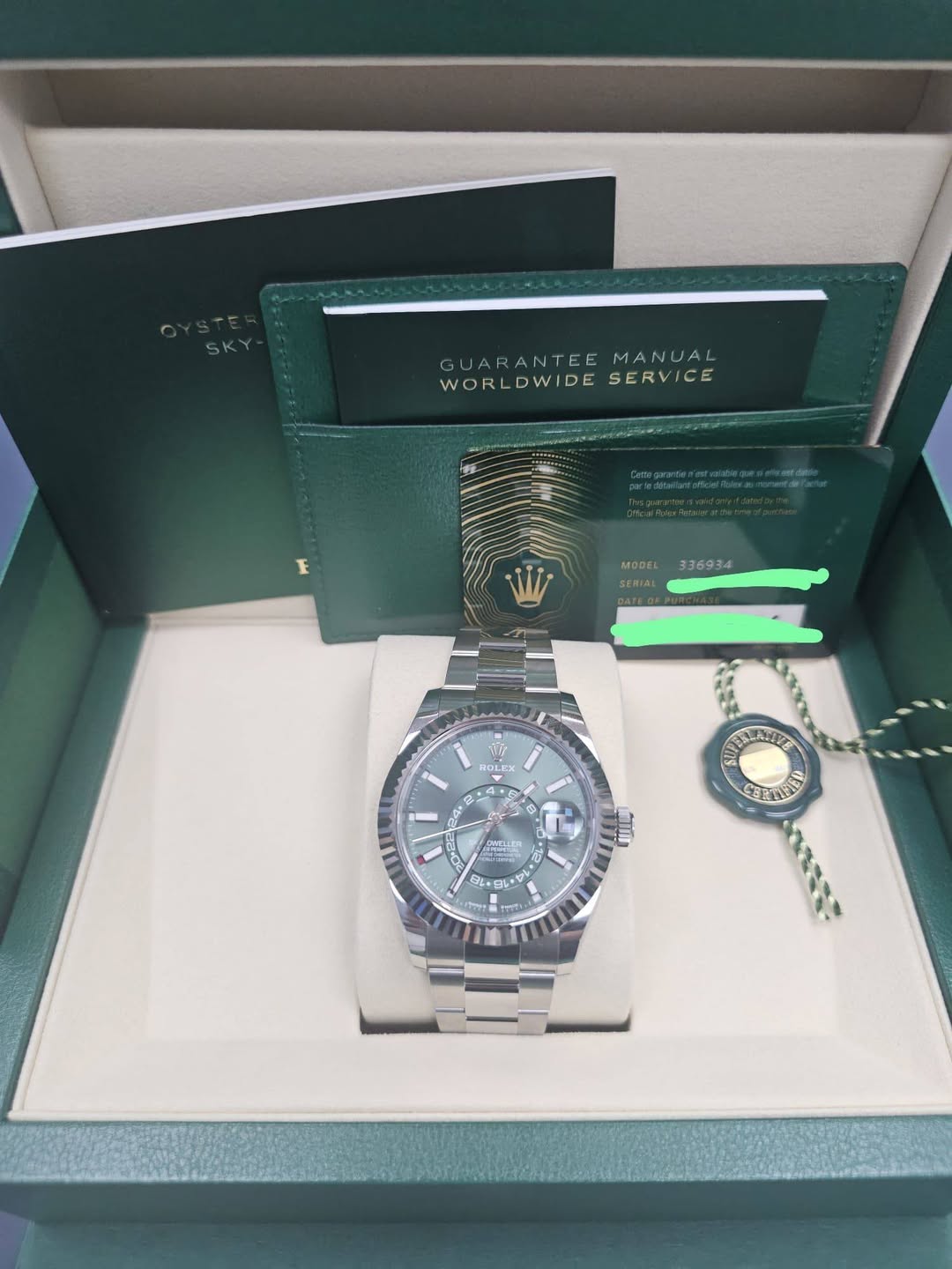 May be an image of wrist watch and text that says 'GUA GUARANTEE GUARANTEEMANUAL BANTEE MANUAL WORL WORLDWIDESERVICE DWIDE SERVICE MOCEL 336934 OL OLE 24. ااافم 生民通 8 M ご 三 መመ…