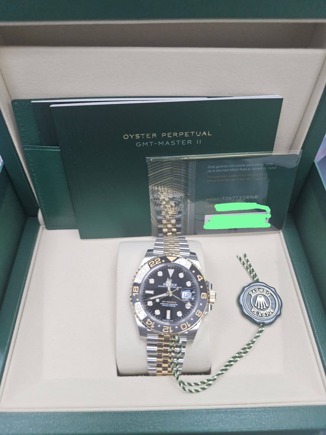May be an image of wrist watch and text