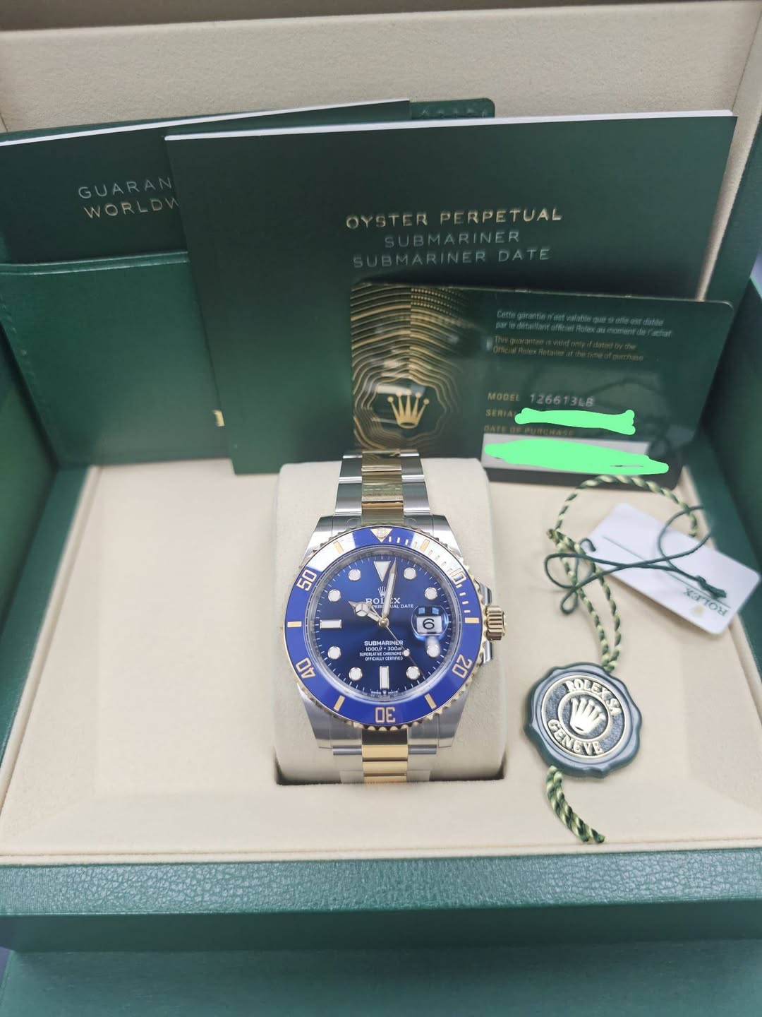 May be an image of wrist watch and text that says 'GUARA WORL OYSTERPI OYSTERPERPETUAL PE RPETUAL 50 OL اید มนา жиTo 20 00 OLET'