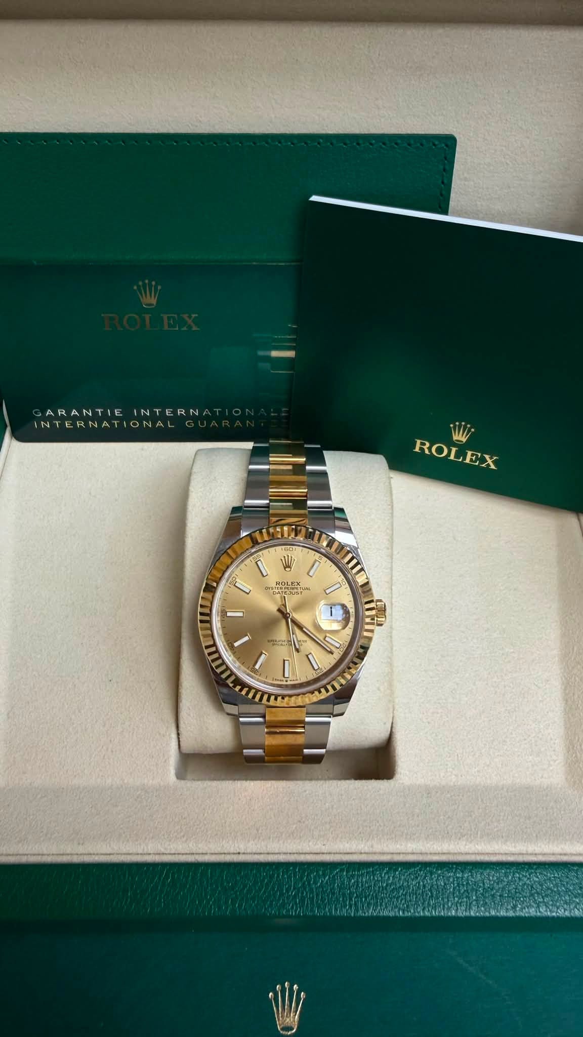 May be an image of wrist watch and text