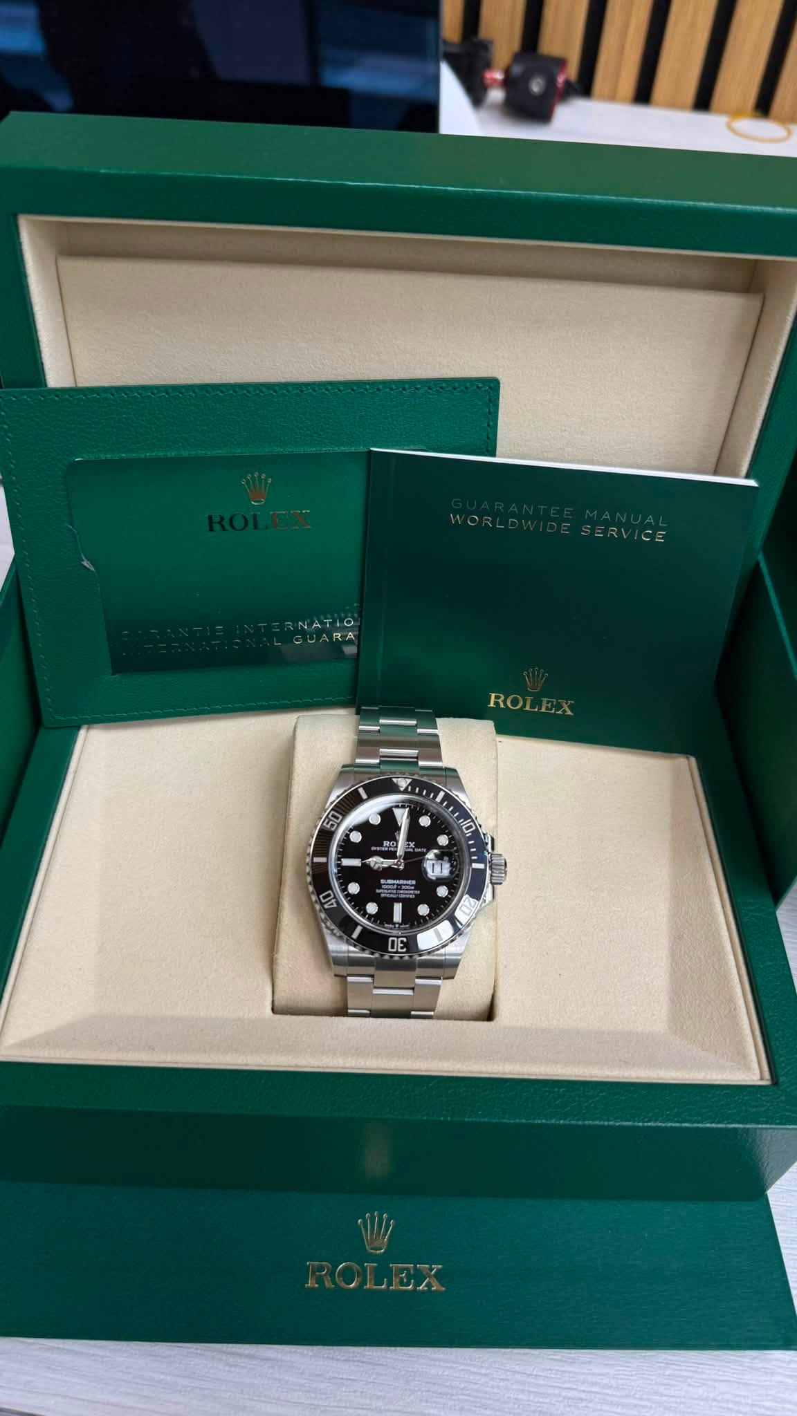 May be an image of wrist watch and text