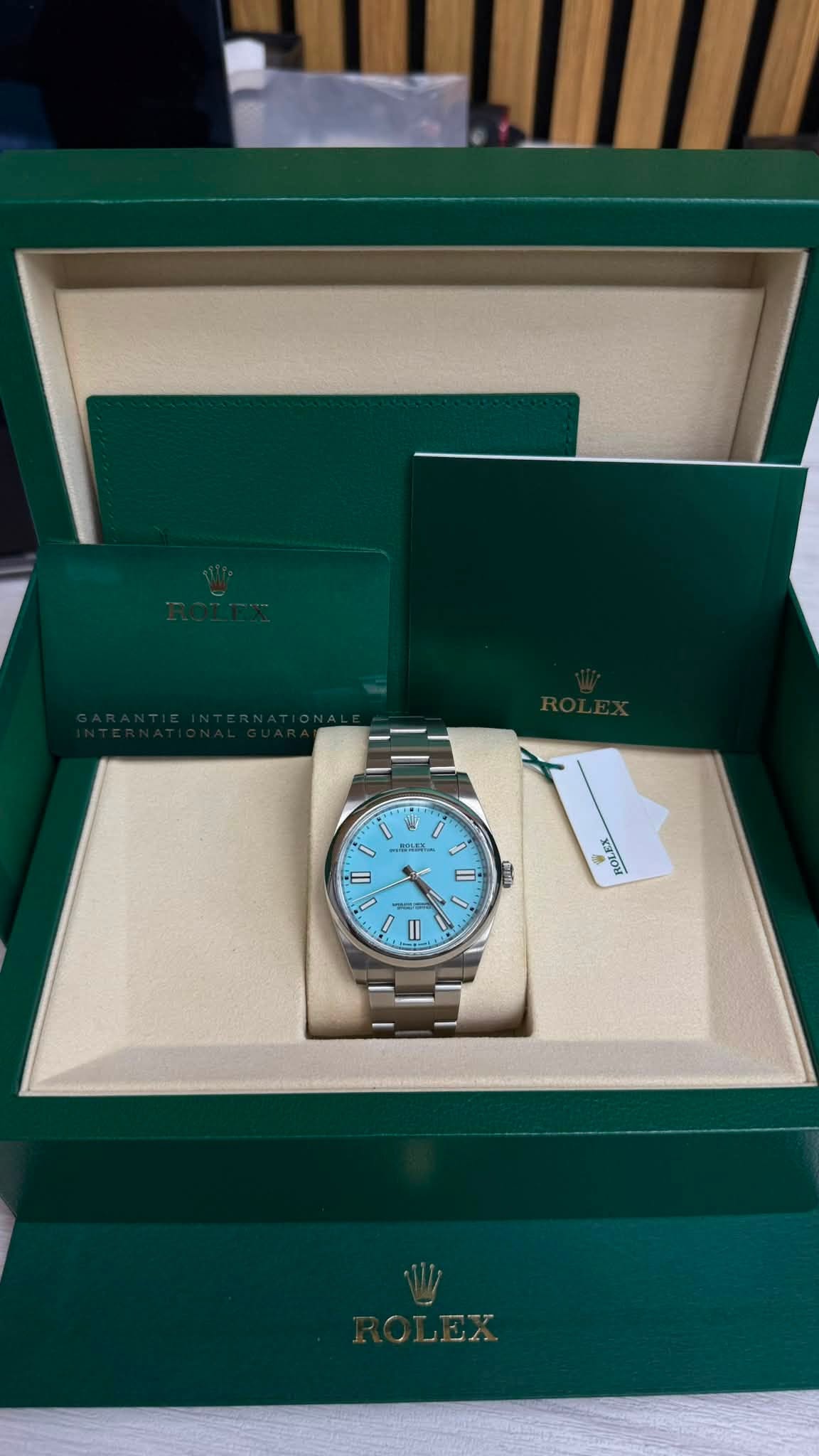 May be an image of wrist watch and text