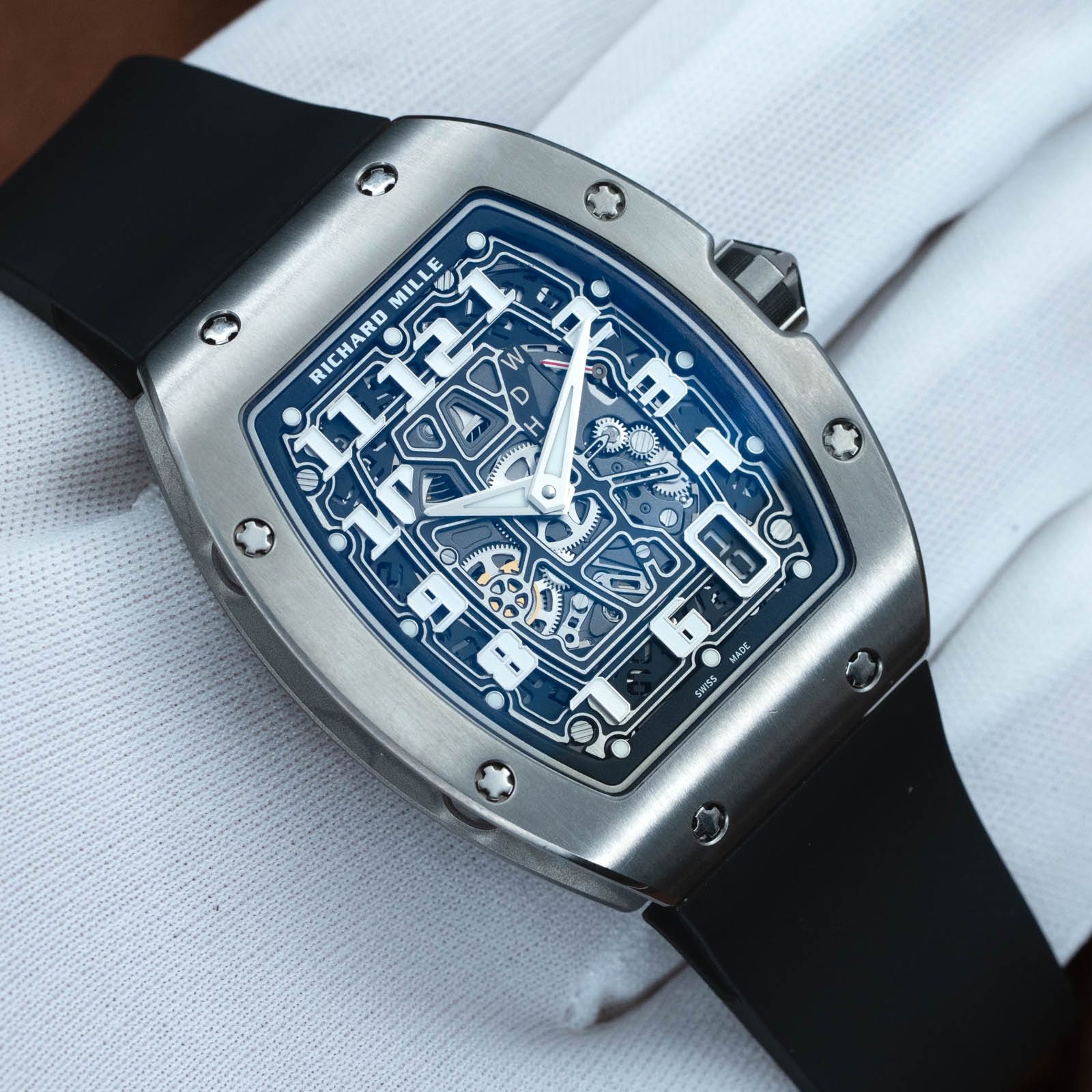 May be an image of wrist watch and text