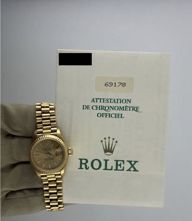 May be an image of wrist watch and text that says '69178 ATTESTATION DE CHRONOMETRE OFFICIEL ROLEX'