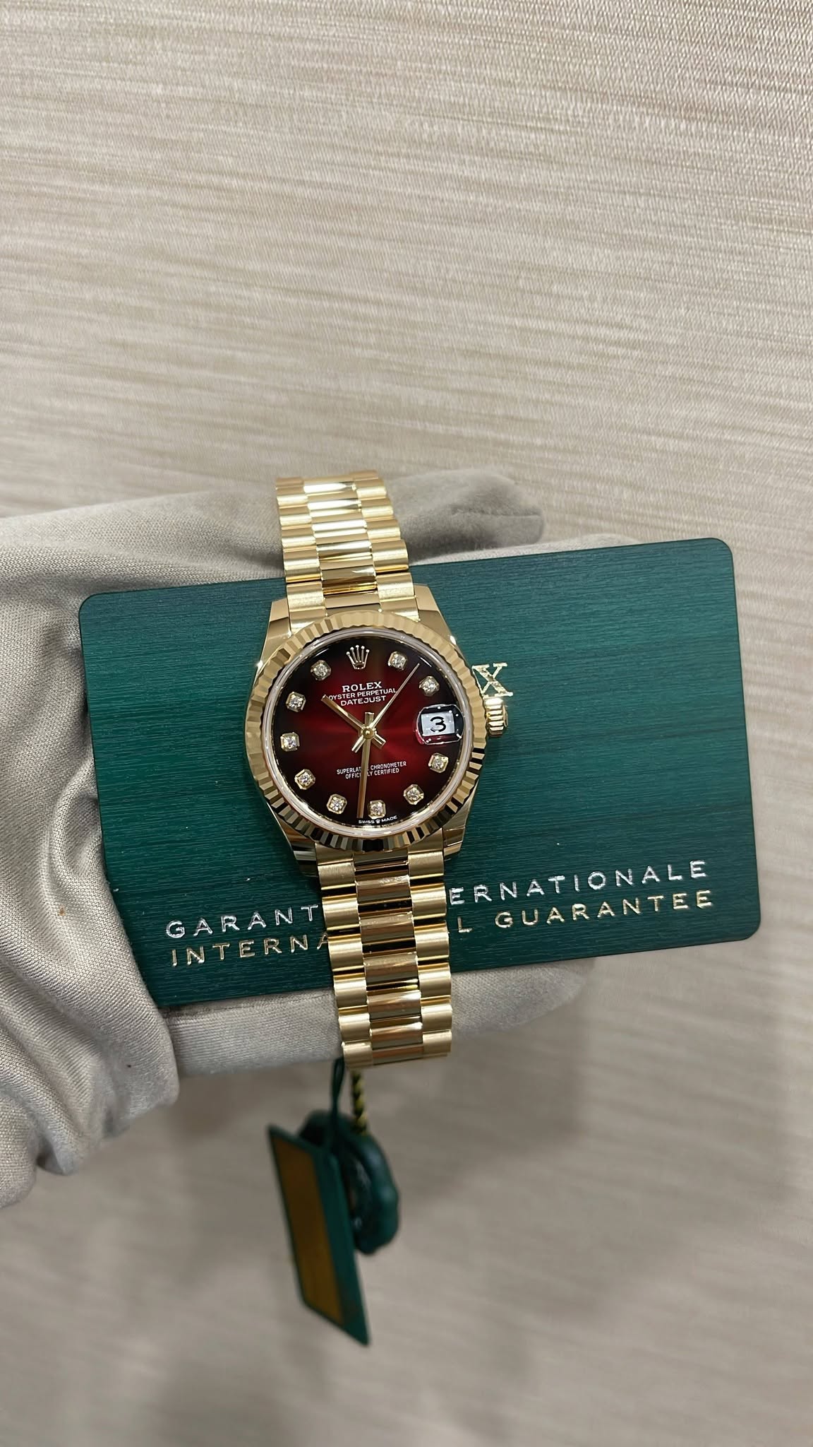 May be an image of wrist watch and text