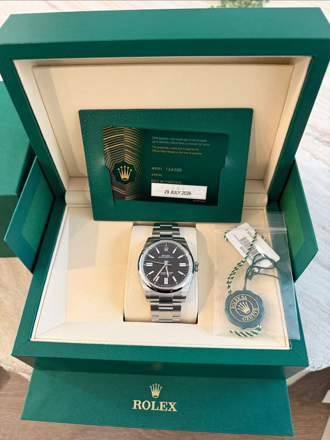 May be an image of wrist watch and text that says '4300 29 JULY JULY 2026 전슈에 아스 No 9000 لمنه BOLEXS WIA 1 VE POLA GENE ROLEX'