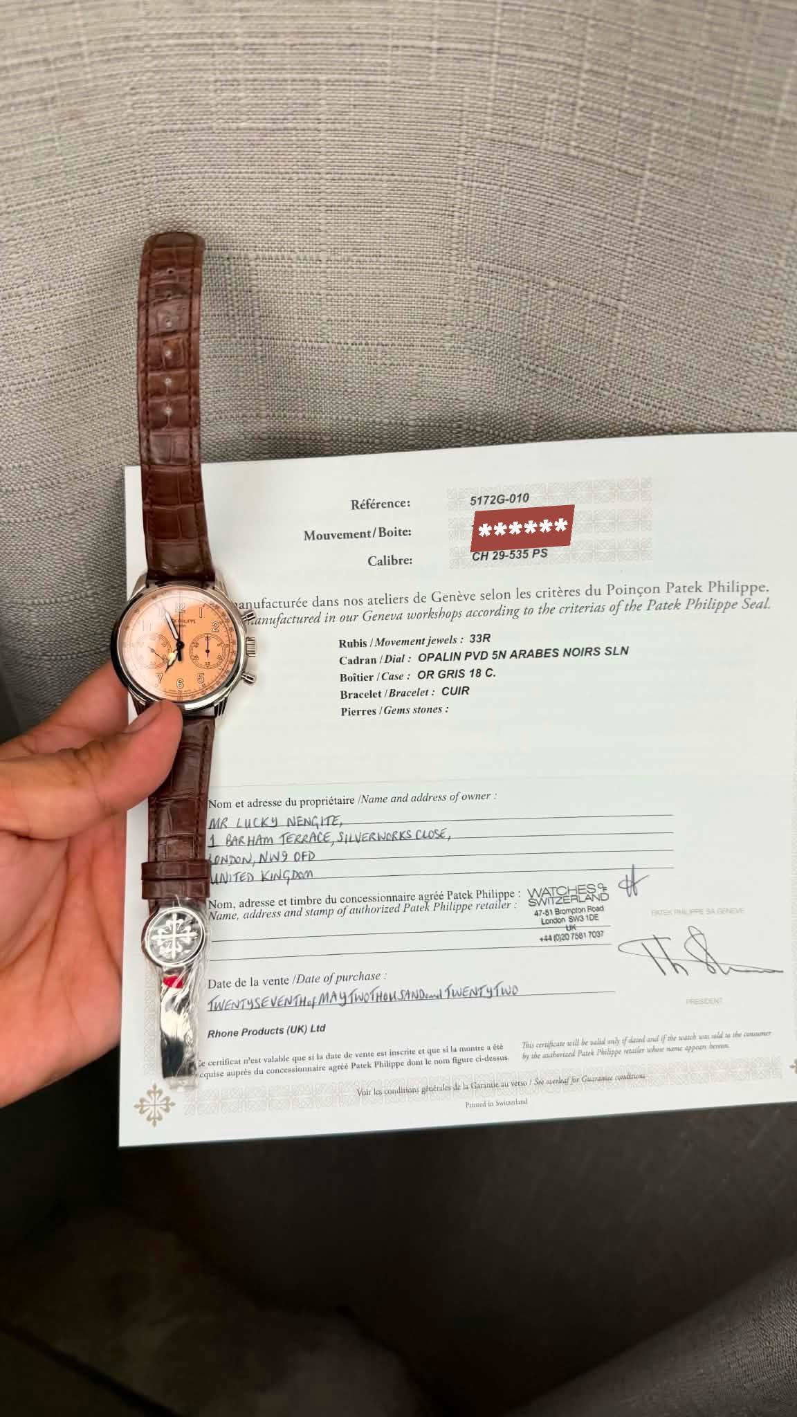 May be an image of ticket stub, wrist watch and text