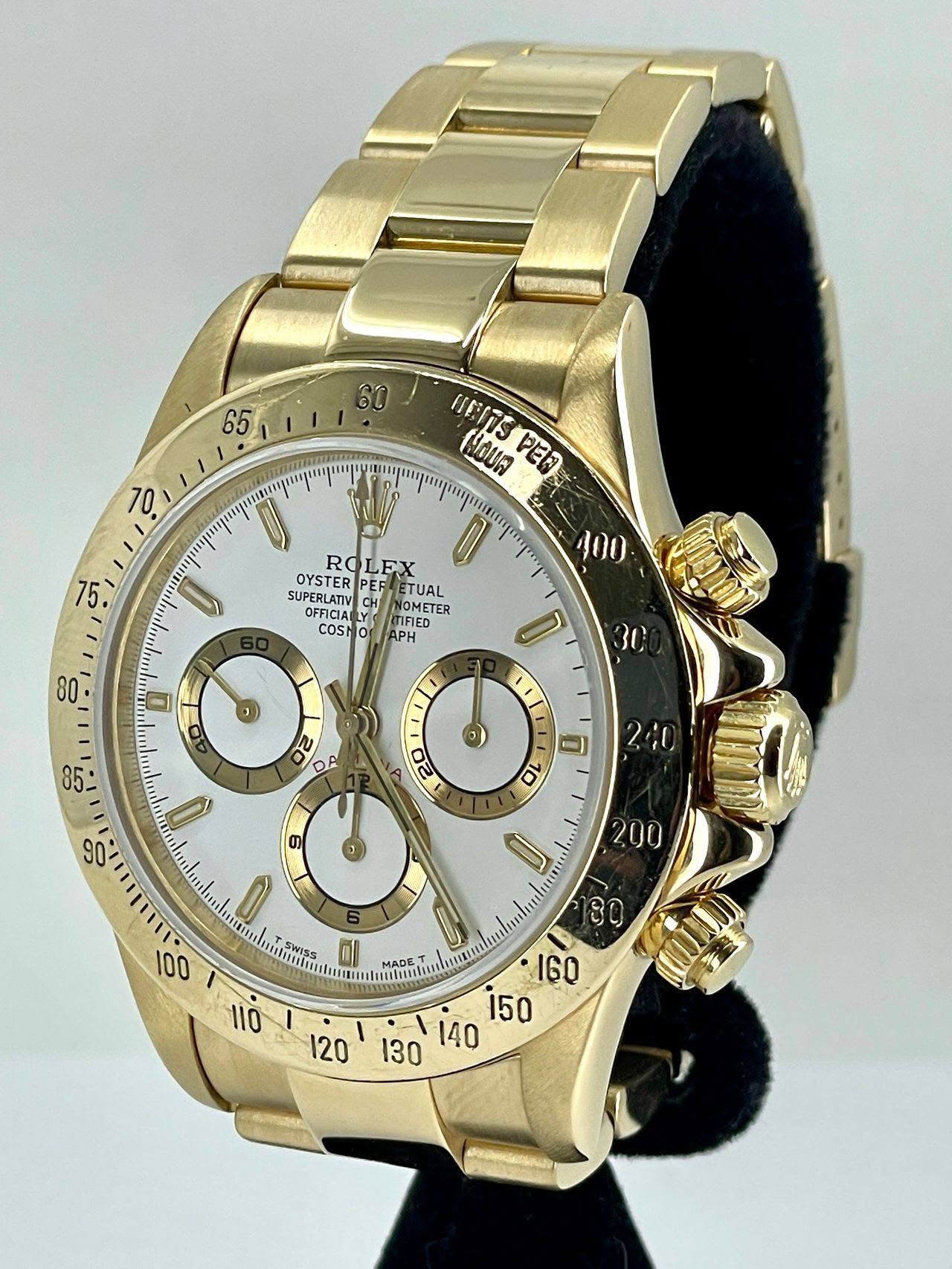 May be an image of wrist watch and text that says '65 60 ! HIOUW UETTS PEN មត ドヒ ویه 100 0 ራ ROLEX EX ROI OYSTER PEF TUAL SUPERLATIV ORATV CH OMETER TER FIED APH U COsh 0 30 I…