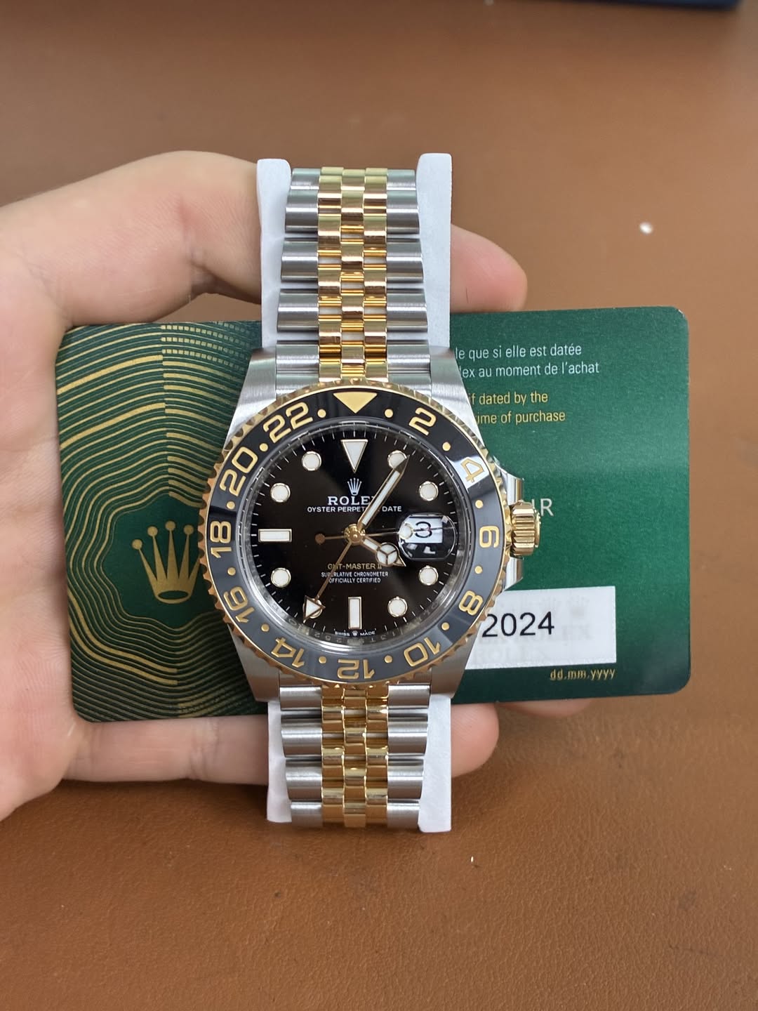 May be an image of wrist watch and text that says 'lequesielleestdatée le lequesi es sie lle es est datée exaumomentdel'achat que ex moment de l'achat dated me 80 of purchase SI…