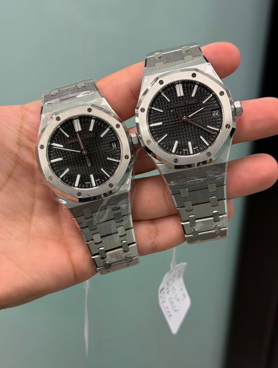 May be an image of wrist watch and text