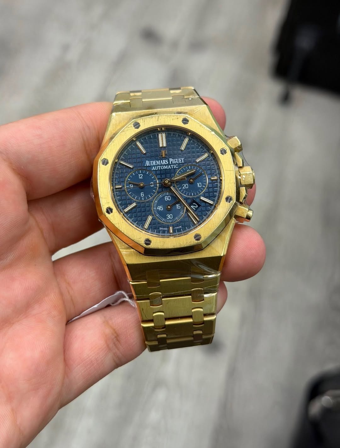 May be an image of wrist watch and text