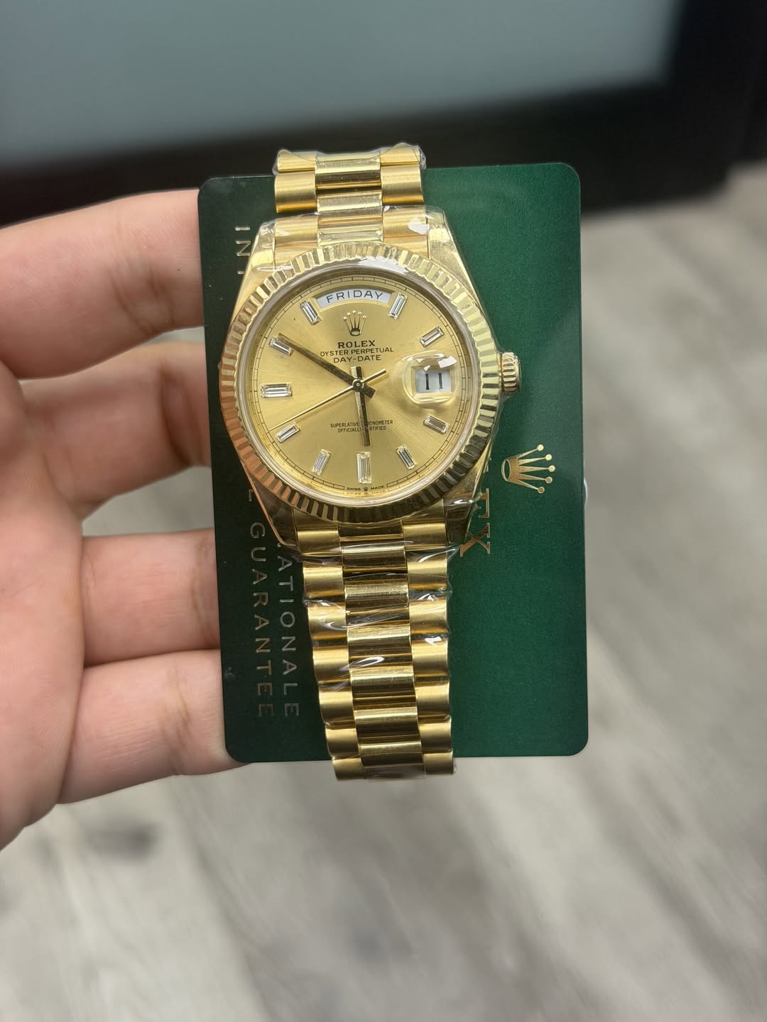 May be an image of wrist watch and text