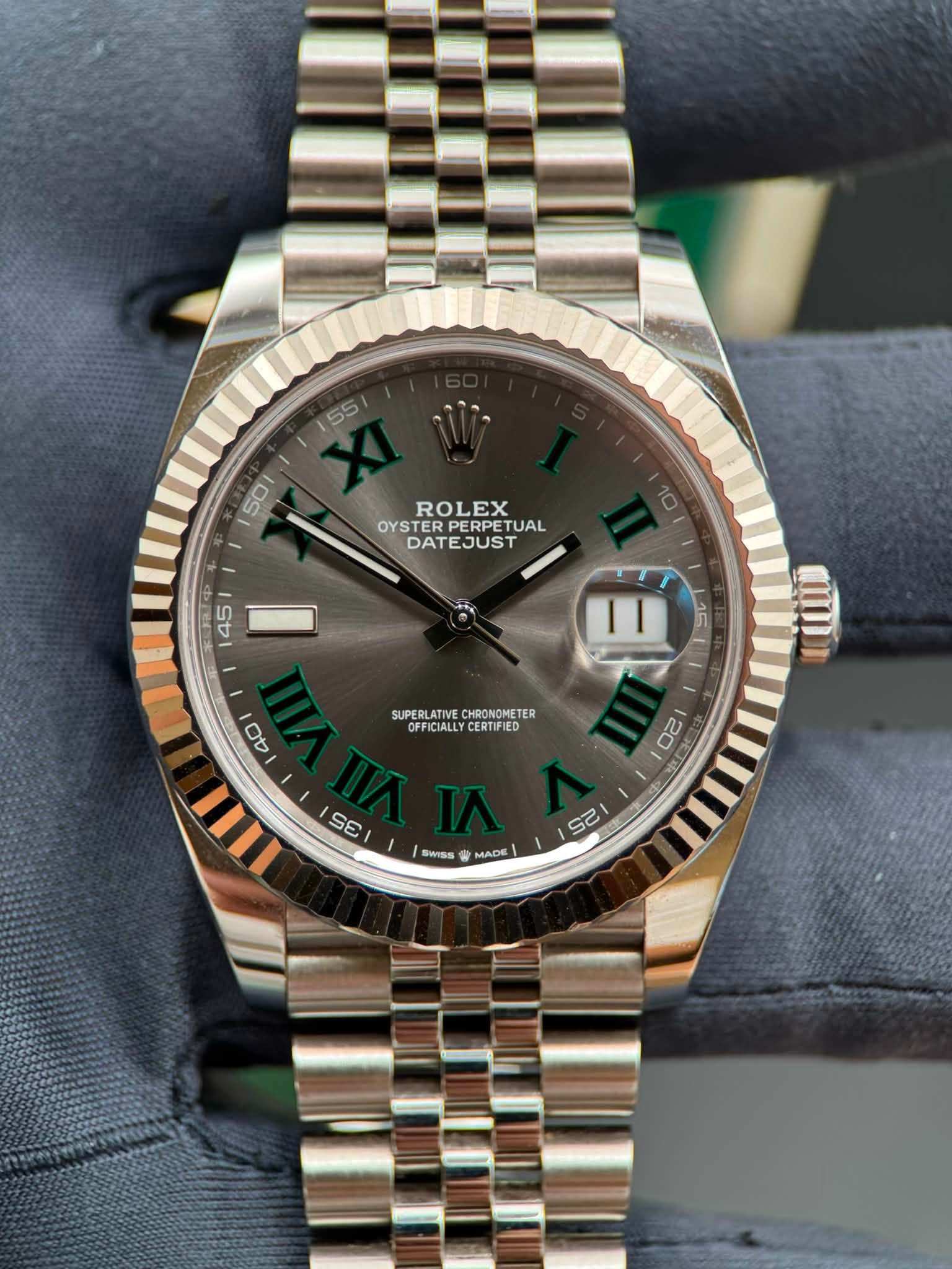May be an image of wrist watch and text that says '55 50 45 ROLEX 10 OYSTER PERPET PERPETUA TUAL DATEJUST Ⅱ 15 SUPERLATIVE CHRONOMETER SUPERLATIVECHRONOHETER SUPERLATALLCCONDMTER…