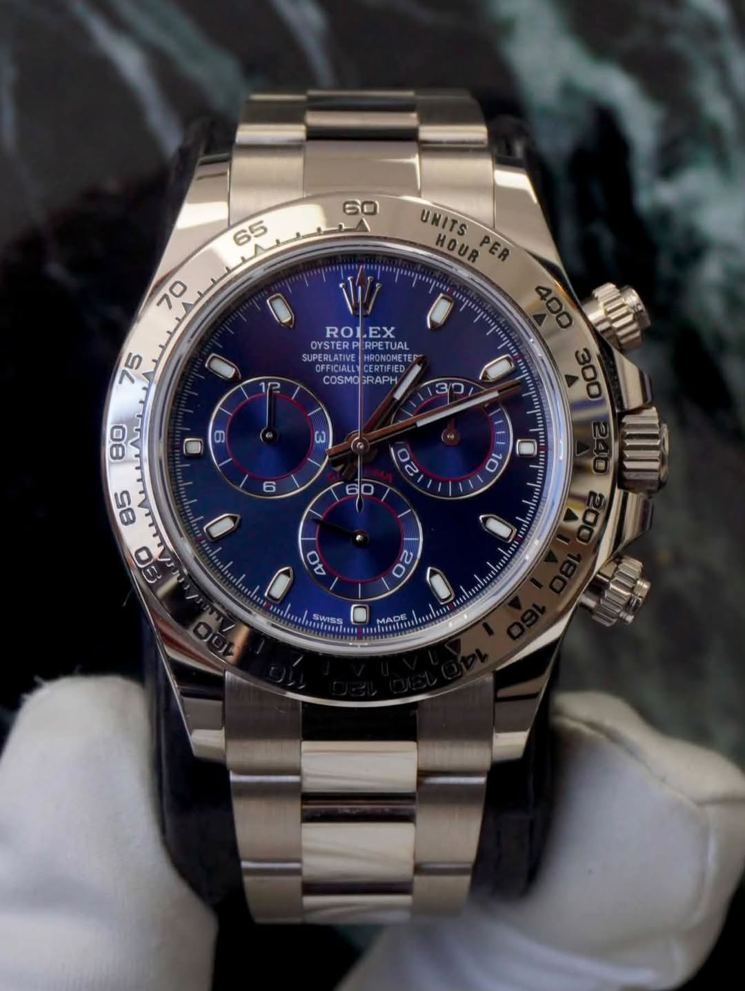 May be an image of wrist watch and text that says '60 65 65ေ် اسال UNITS HOUR 70 75 ROLEX OYSTER RPETUAL SUPERLATIVE UPERLATIVE CERTIFIED CERTIFIED IROROMETE COSMO COSMOGRAPH…