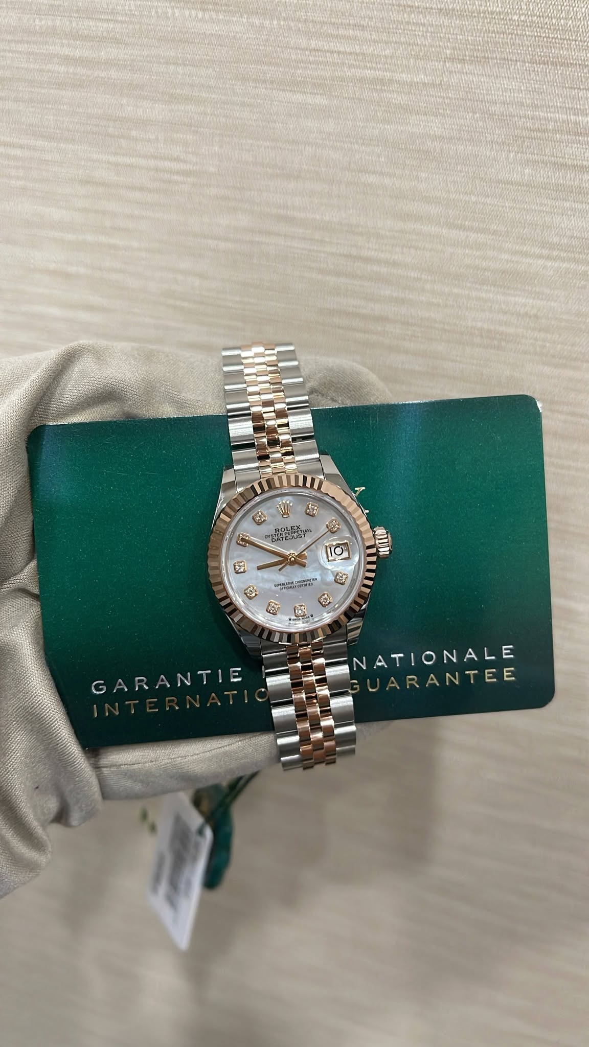 May be an image of wrist watch and text