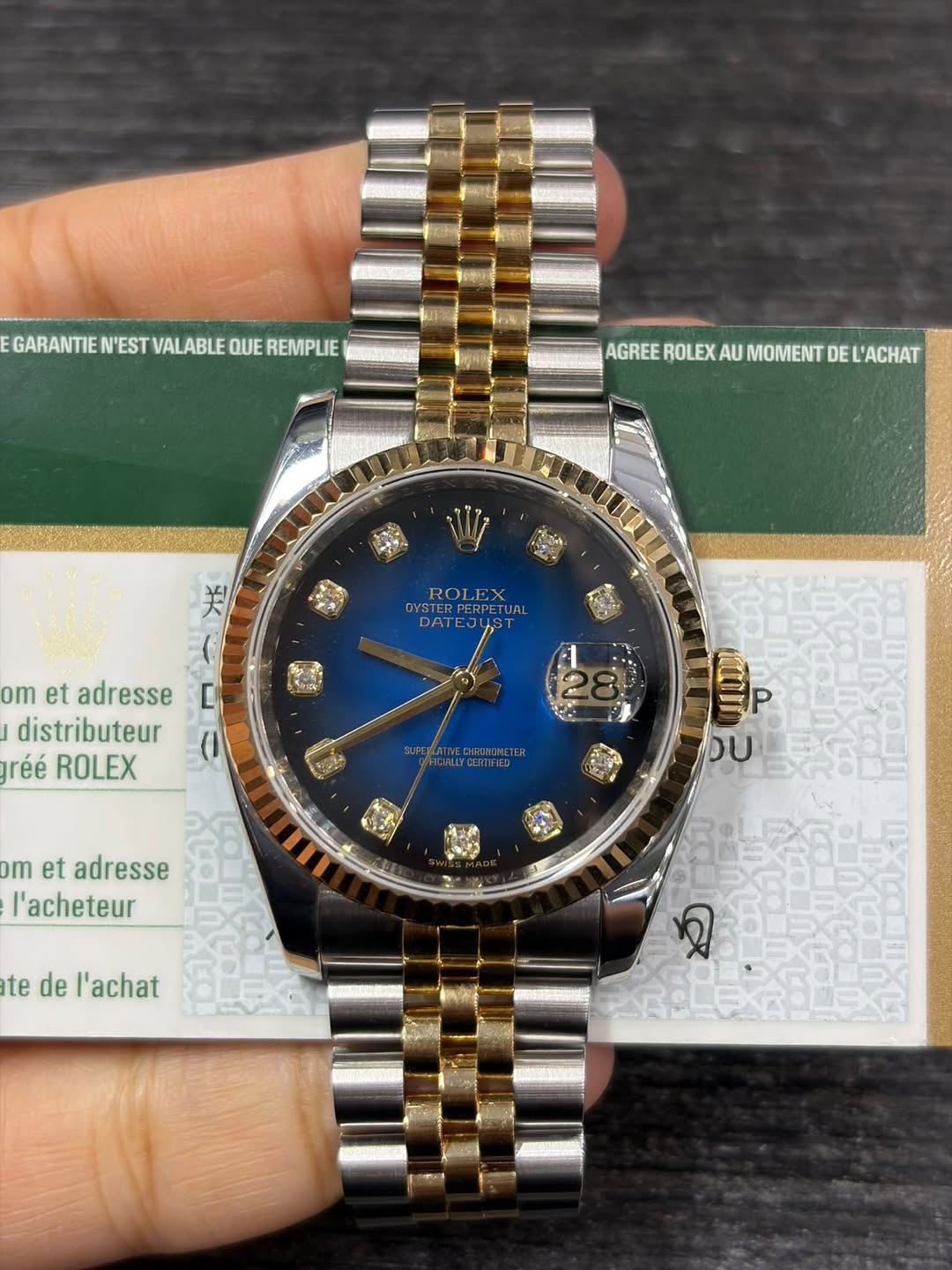 May be an image of wrist watch and text that says 'GARANTIE GARANTIENESTVALABLEQUEREMPLE N'EST VALABLE QUE REMPLIE AGREE ROLEX AGREEROLEXAUMOMENTDELACHAT X AU MOMENT DE L'ACHAT 性…