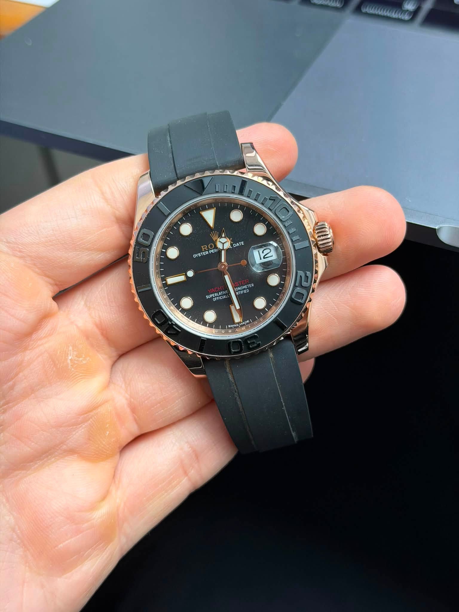 May be an image of wrist watch and text