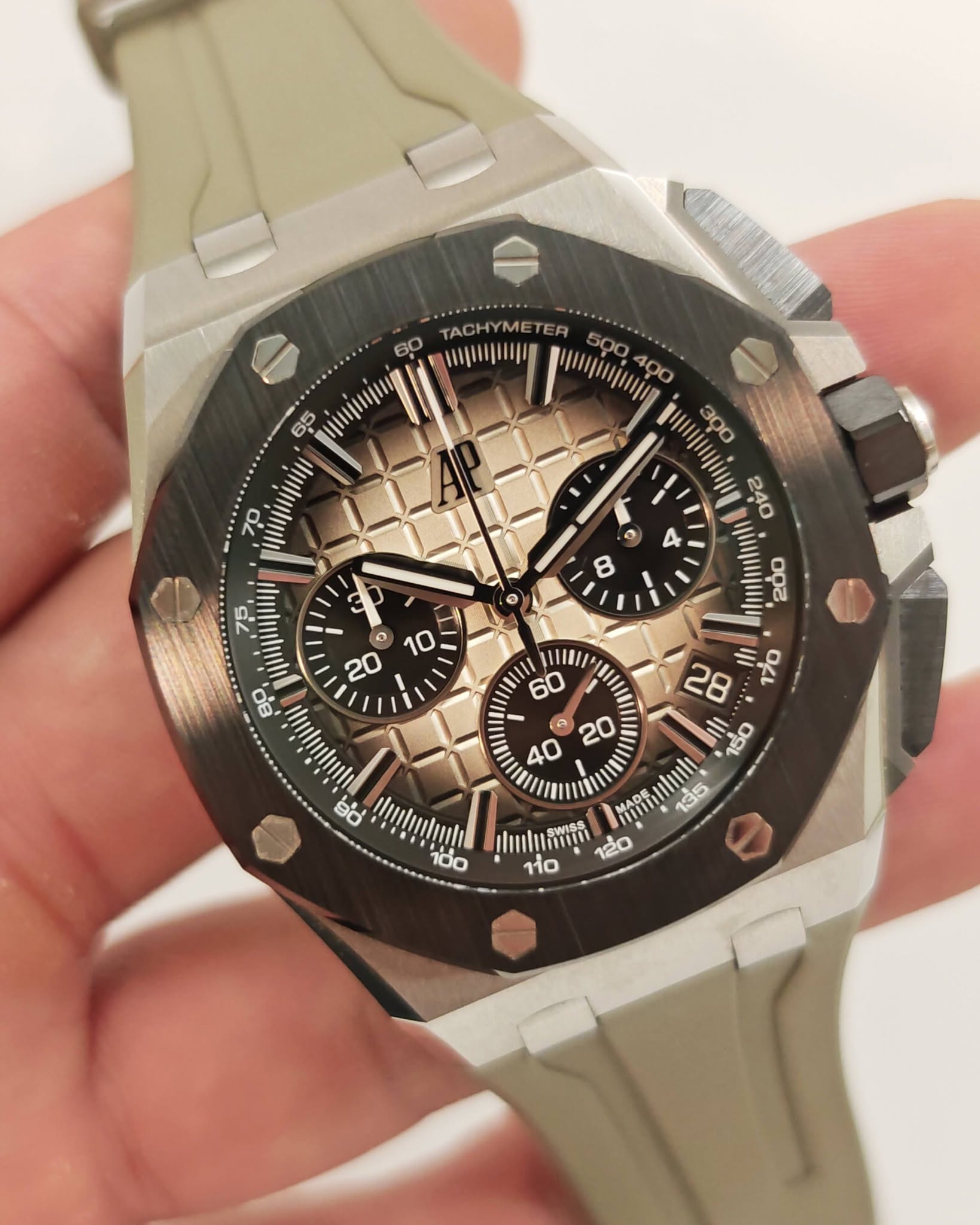May be an image of wrist watch and text